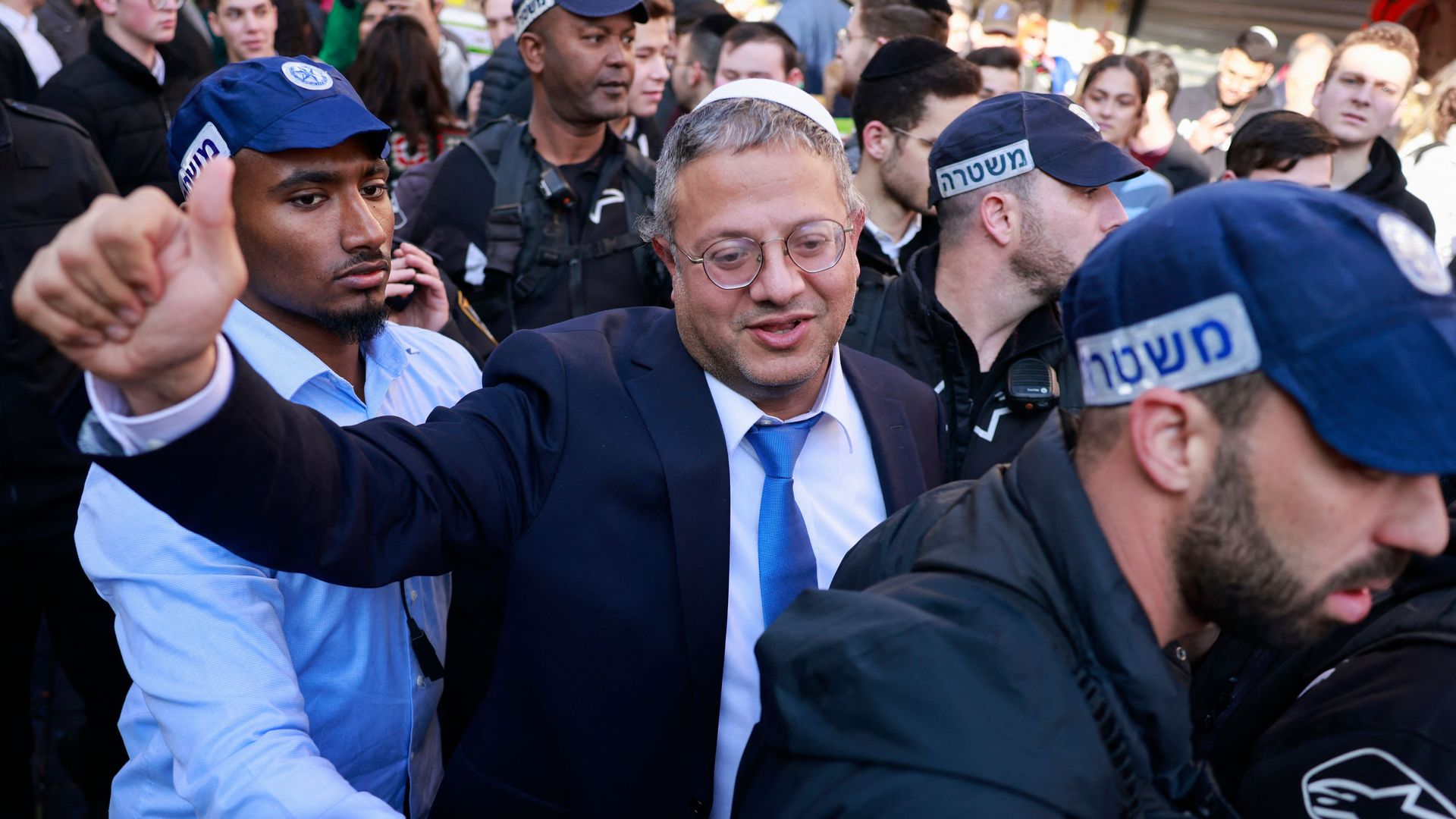 Itamar Ben Gvir, Israel's new Minister of National Security and leader of the far-right Otzma Yehudit (Jewish Power) party, greets supporters during a visit to Jerusalem