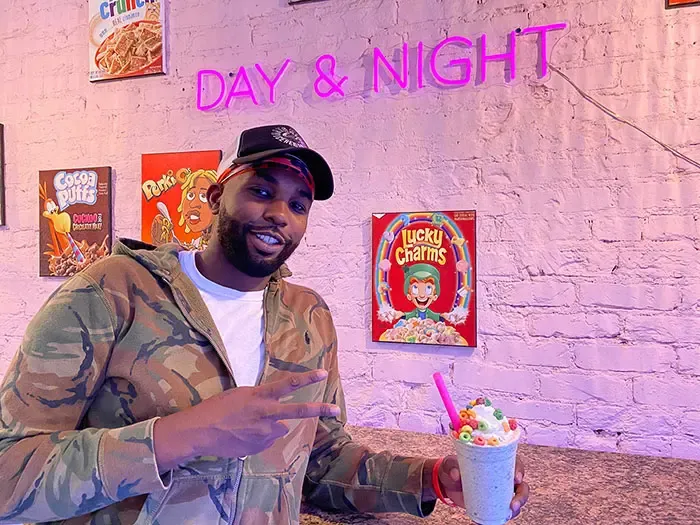 Day & Night co-owner Greg Robinson poses with Cosmo & Wanda