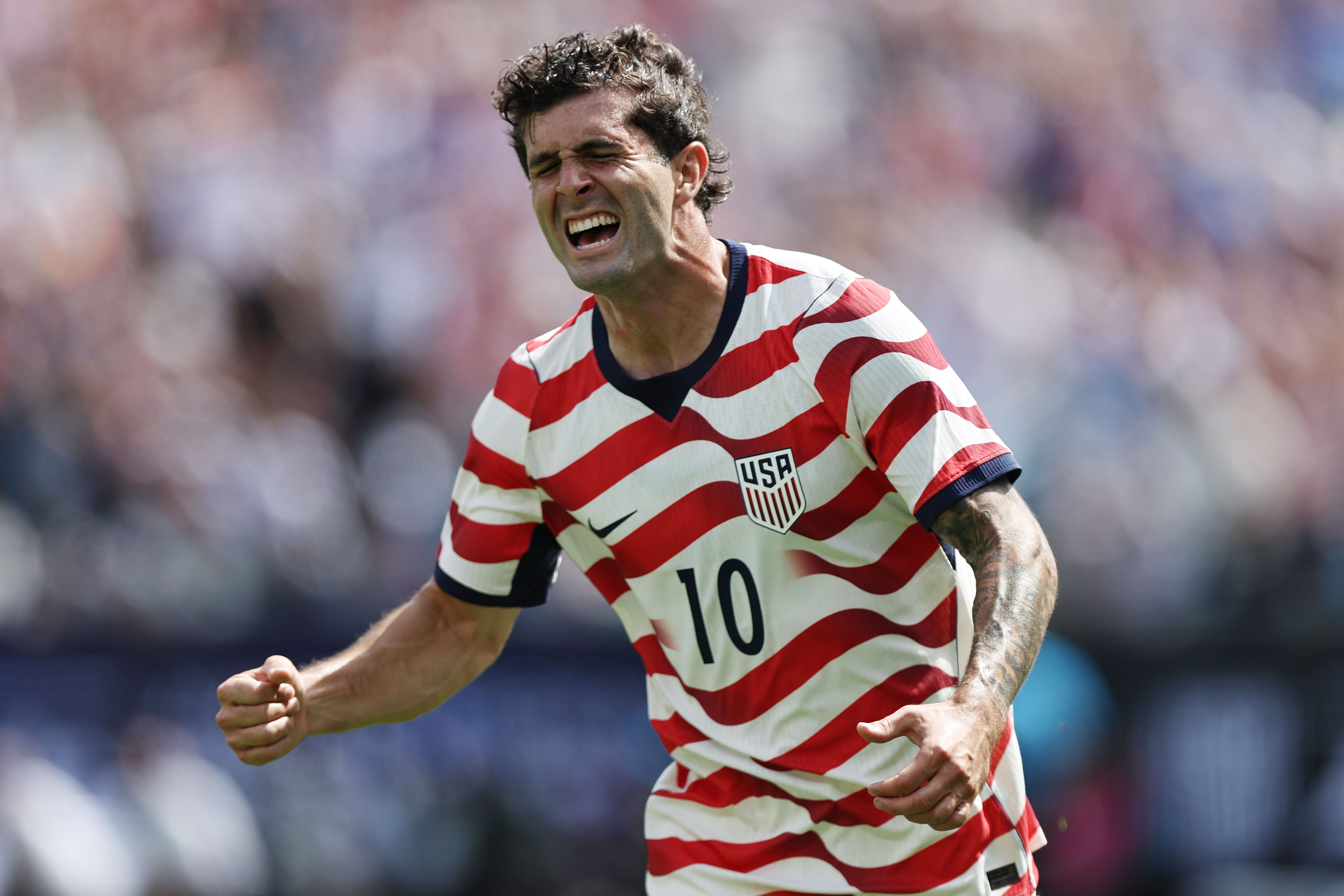 Christian Pulisic celebrates after scoring USA's second goal during a friendly match against Senegal in Charlotte, North Carolina on May 31.