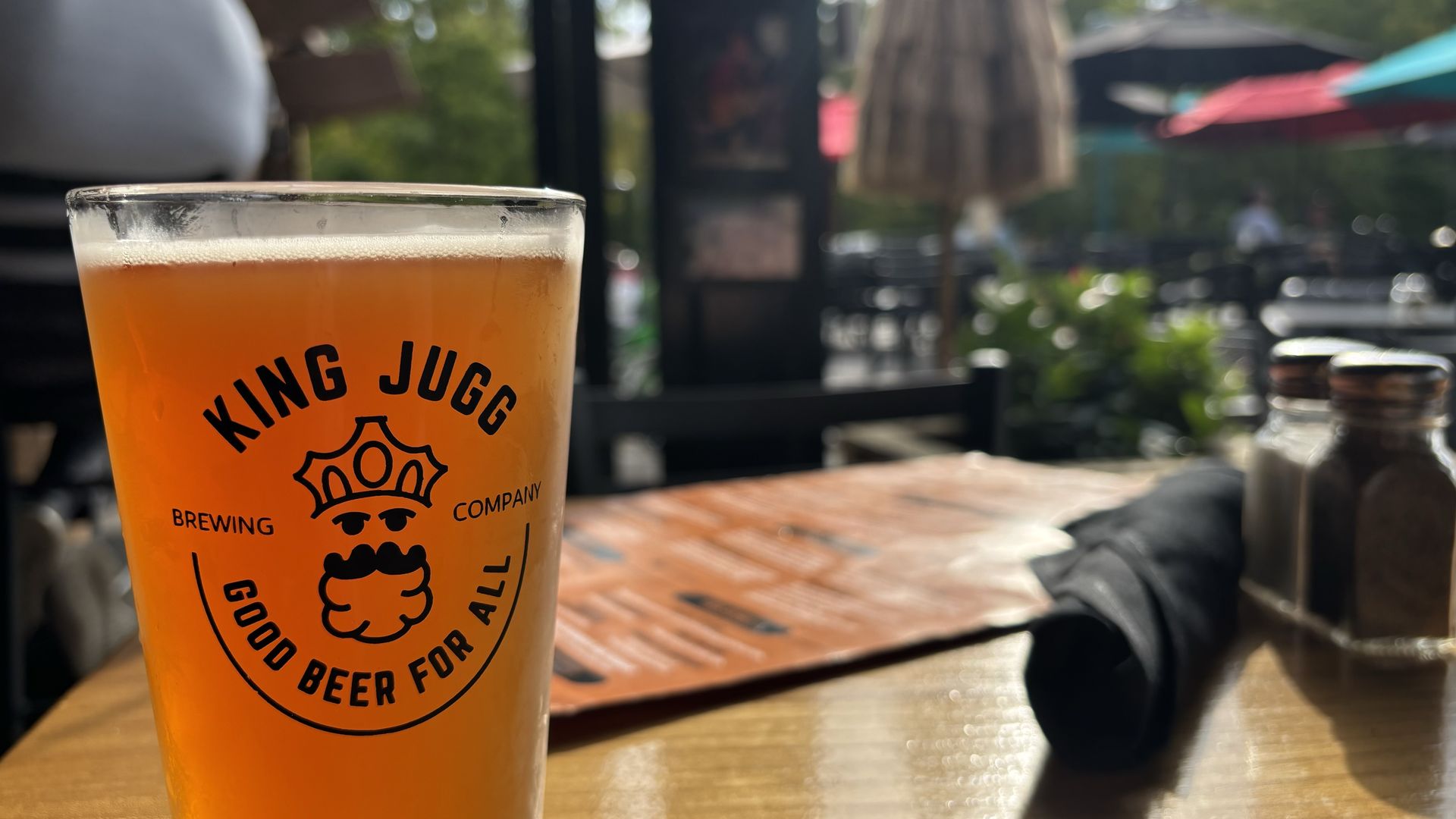 A glass of beer on a table