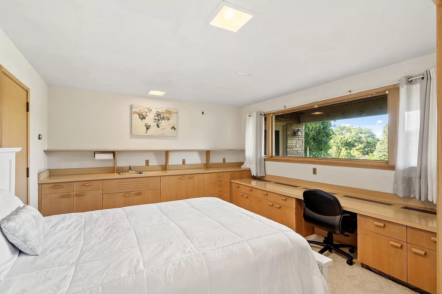 A bedroom in a basement.