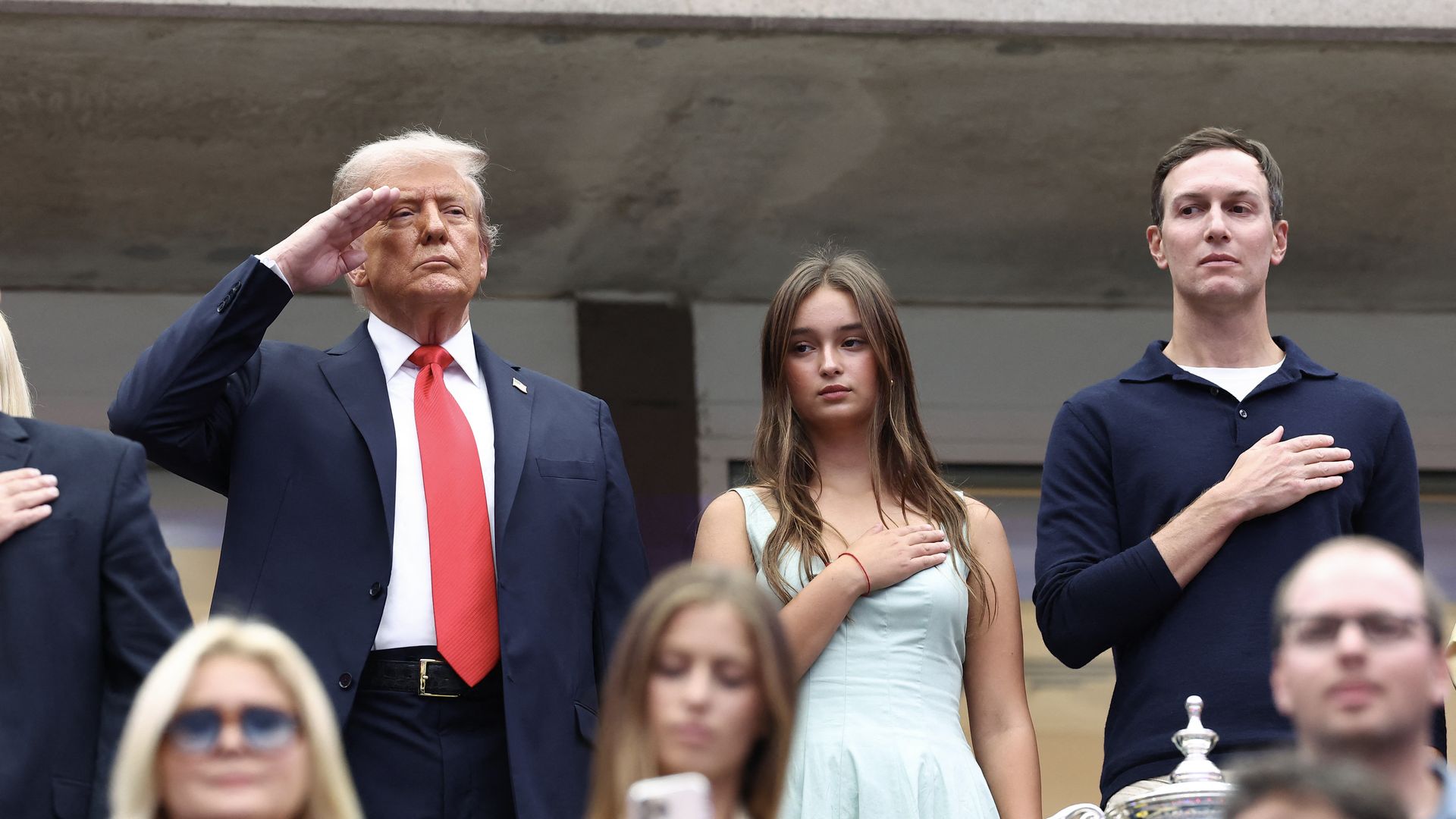 Three people standing