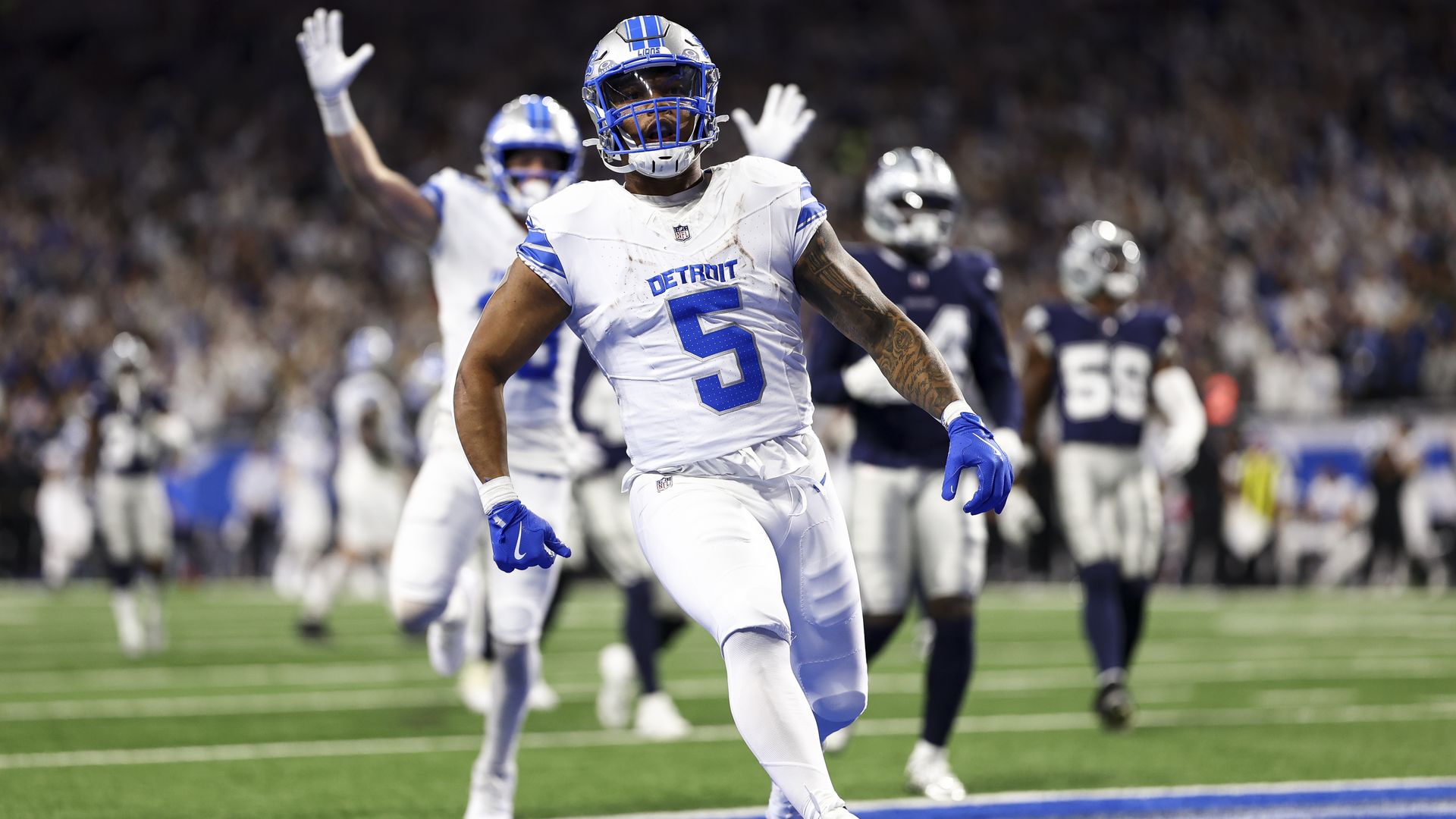 David Montgomery scores against Dallas in December. 