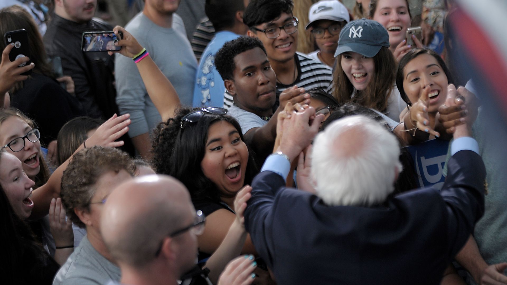 Democratic presidential candidate Sen. Bernie Sanders (I-VT) shakes hands with supporters on the campus of the University of Chapel Hill on September 19, 2019 in Chapel Hill, North Carolina