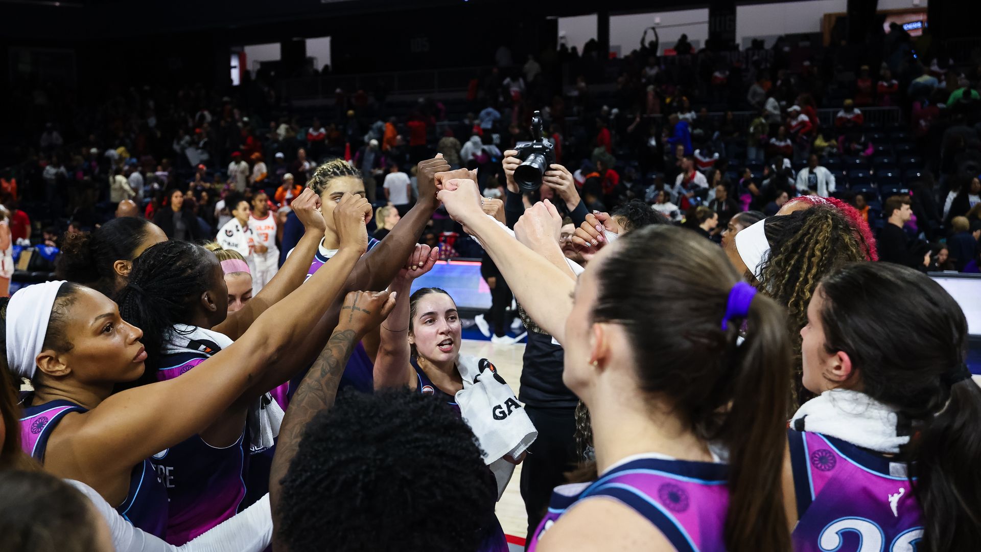 Washington Mystics players celebrate after the game against the Connecticut Sun at CareFirst Arena on September 22, 2026 in Washington, DC.