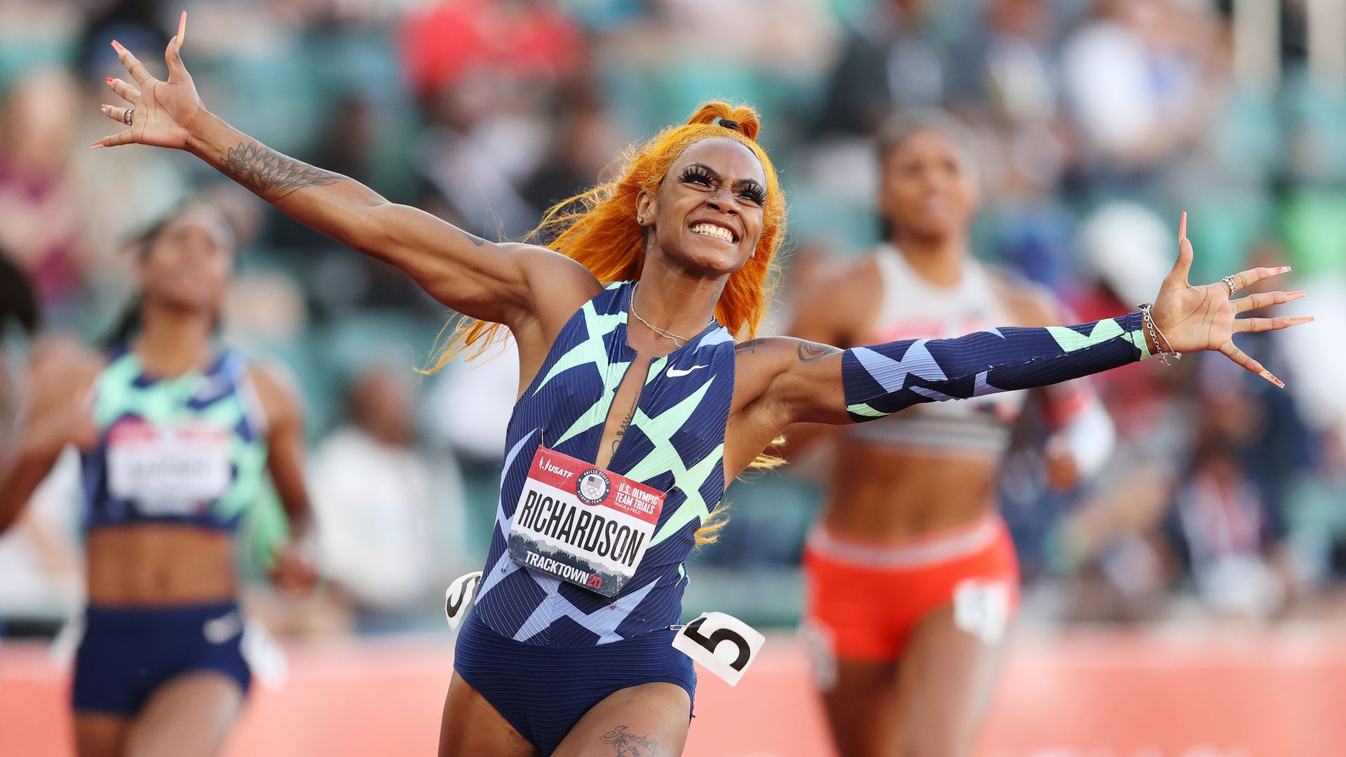 Sha'Carri Richardson celebrates winning the Women's 100 Meter final on day 2 of the 2020 U.S. Olympic Track & Field Team Trials at Hayward Field.