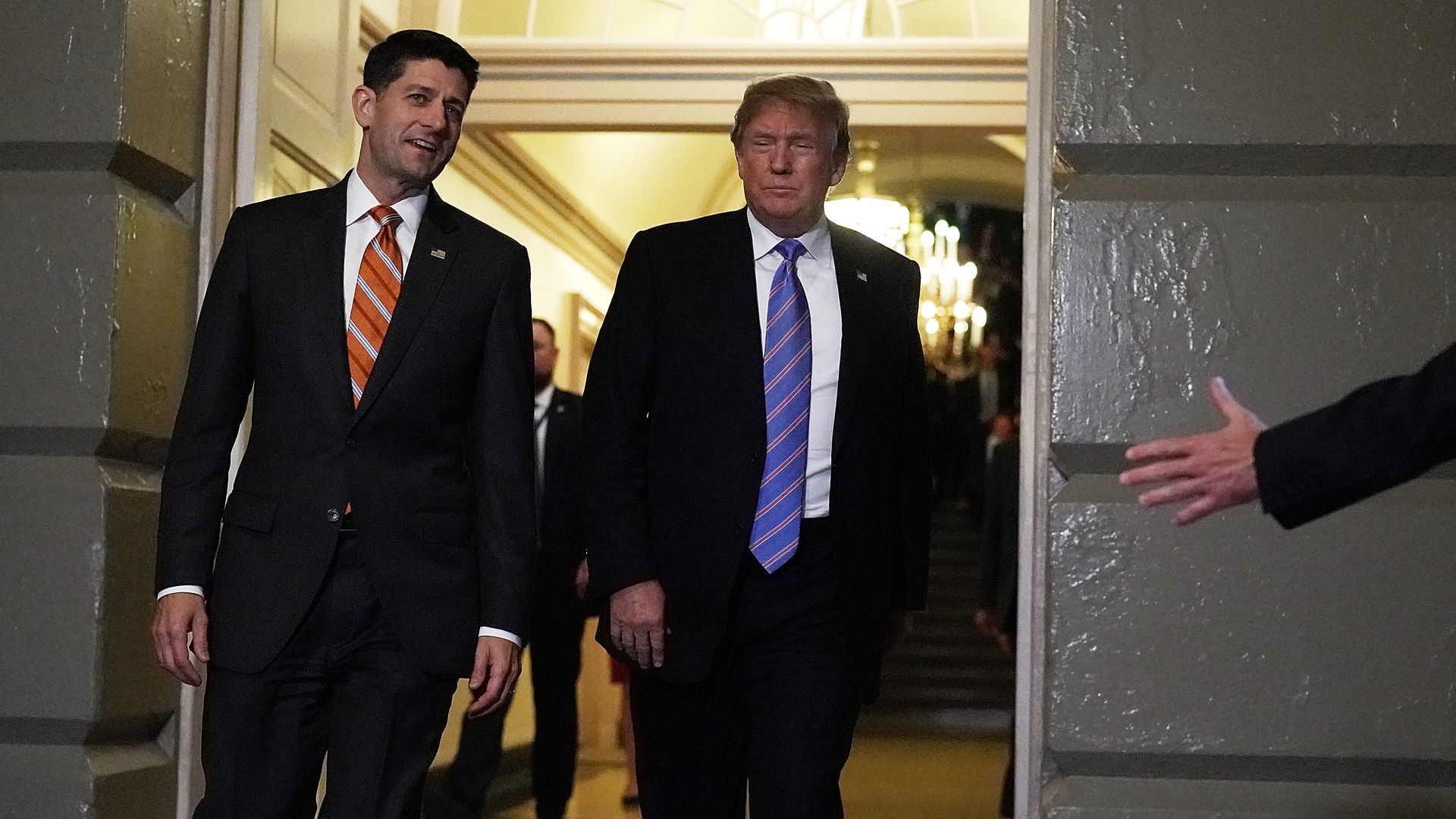 Speaker of the House Rep. Paul Ryan (R-WI) (L), U.S. President Donald Trump (R) arrives at a meeting with House Republicans at the U.S. Capitol 