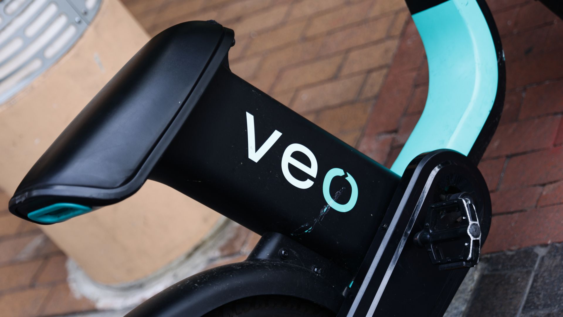 A photo showing a closeup of a Veo scooter