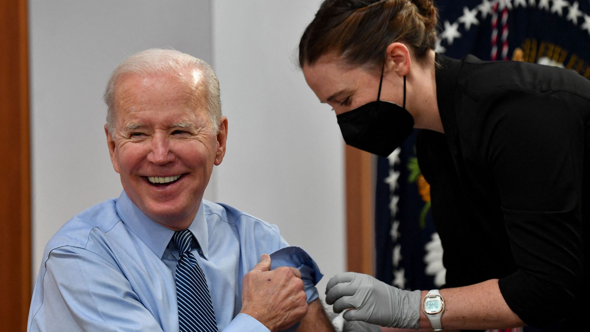 President Joe Biden receives a second booster shot of the Pfizer Covid-19 vaccine in the South Court Auditorium, next to the White House, 