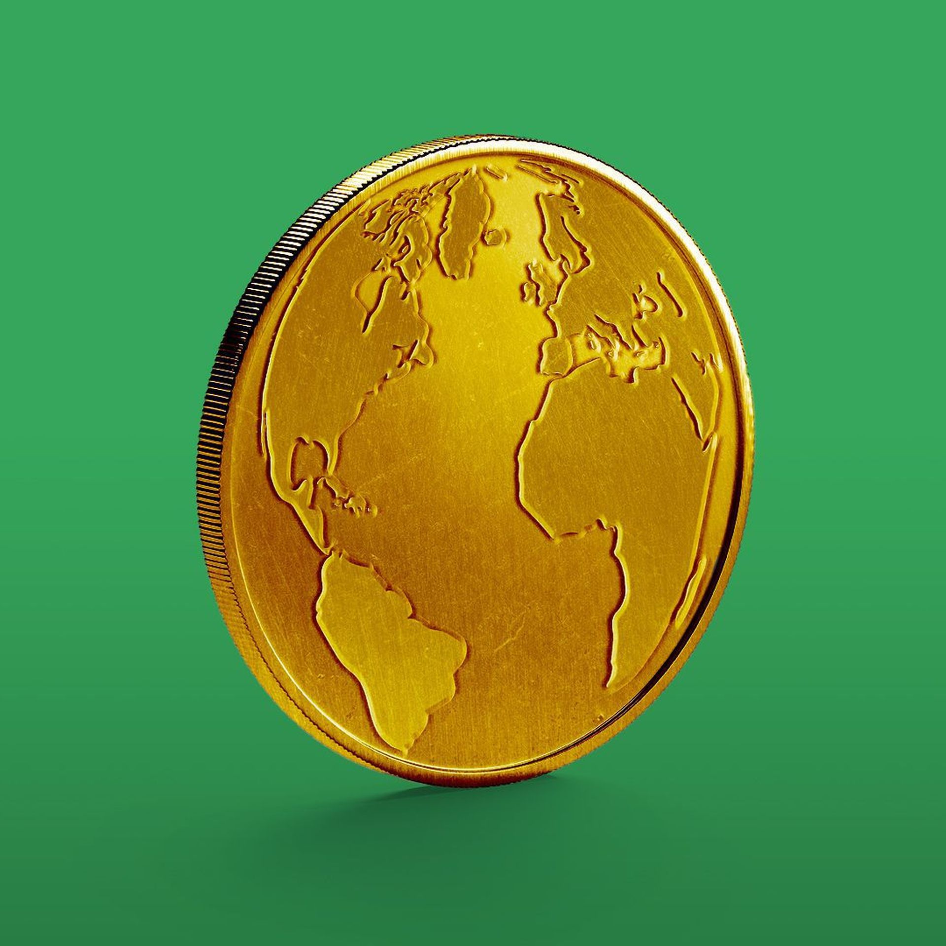 Globe on gold coin and green background