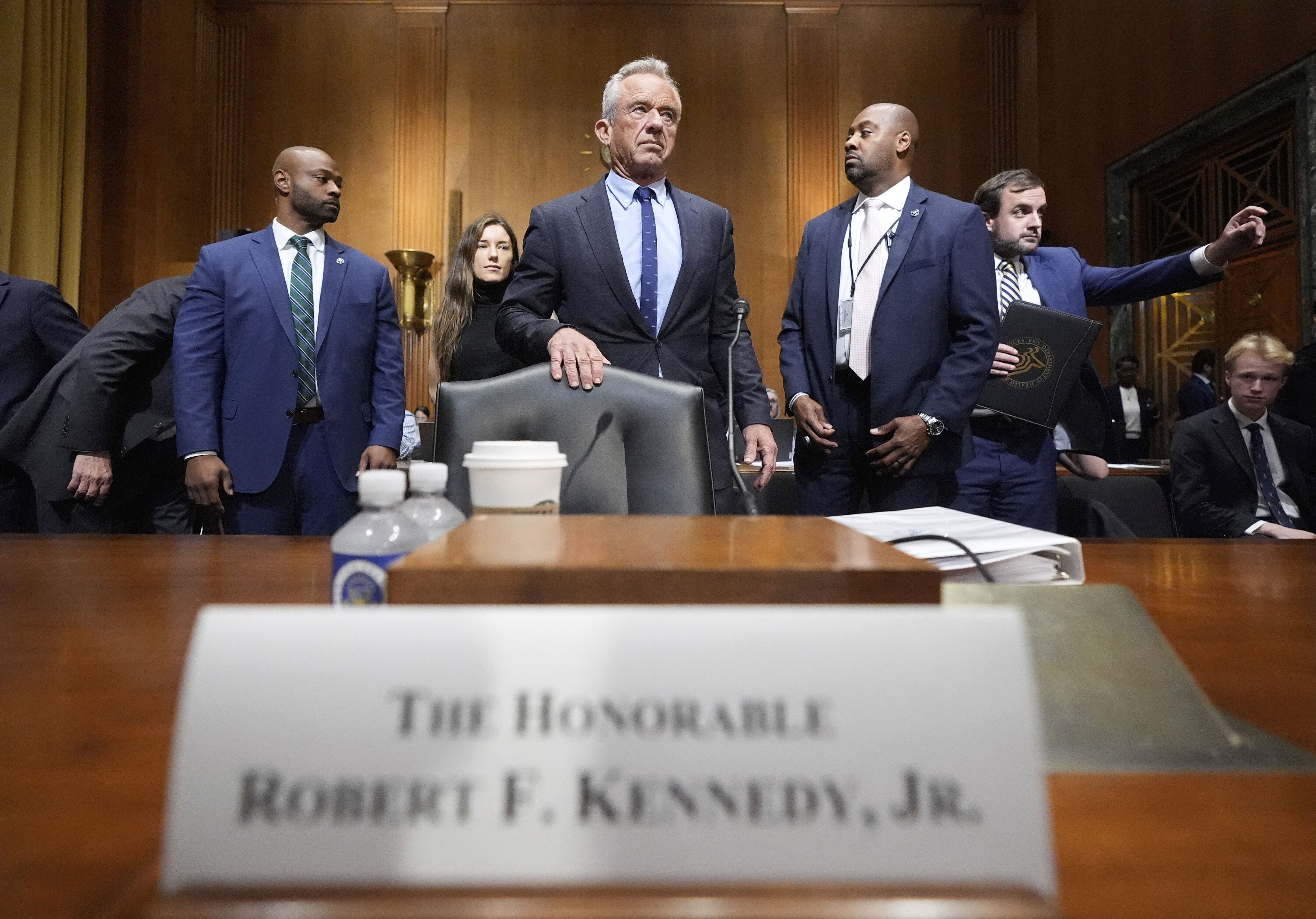 Secretary of Health and Human Services Robert F. Kennedy Jr. arrives at a Senate Finance Committee hearing yesterday. 