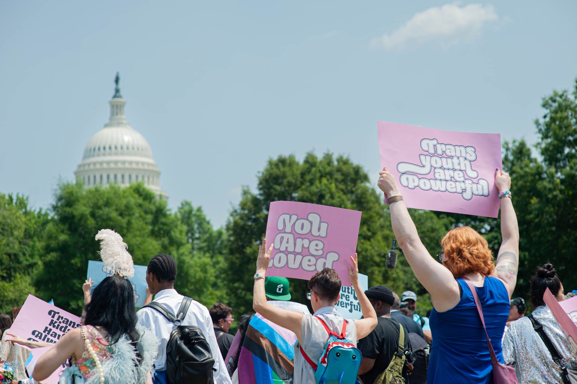 Youths, parents and advocates march in a parade after the Trans Youth Prom in Washington D.C. on May 22, 2023.