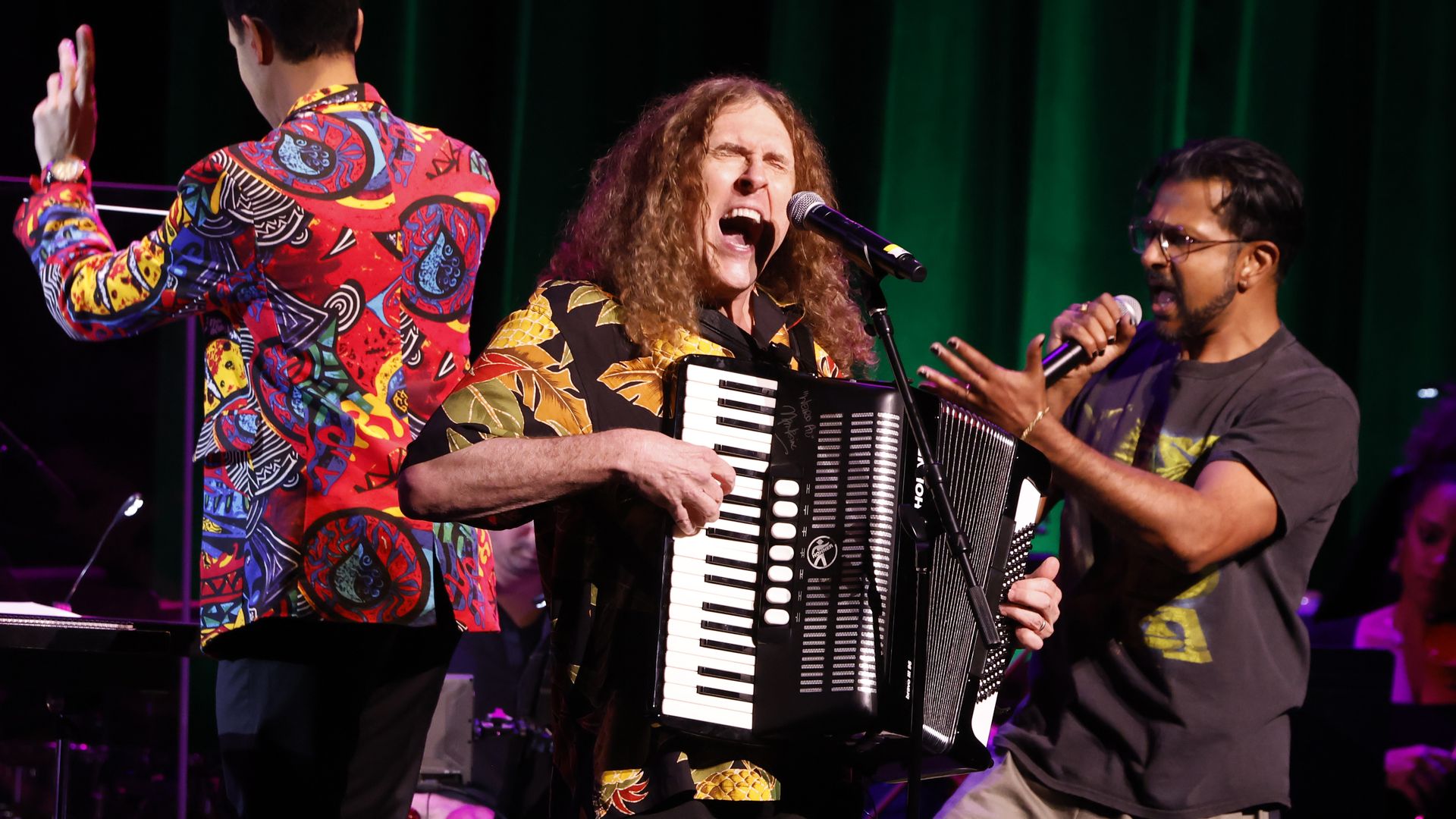 Sean Mayes, "Weird Al" Yankovic and Utkarsh Ambudkar perform onstage during the 2025 Town Hall Spring Shout Benefit Concert at Town Hall on May 19, 2025 in New York City.