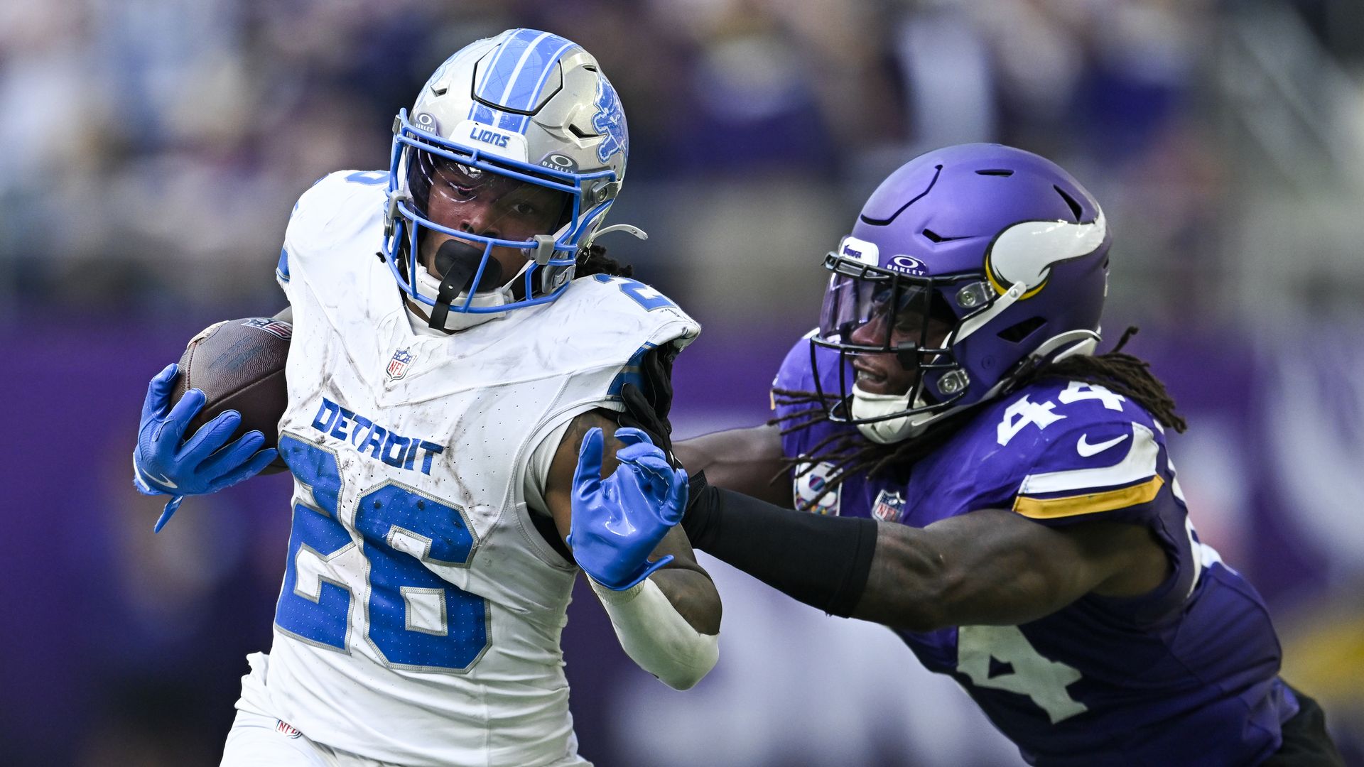 Jahmyr Gibbs carries the ball against the Vikings at U.S. Bank Stadium in October. 