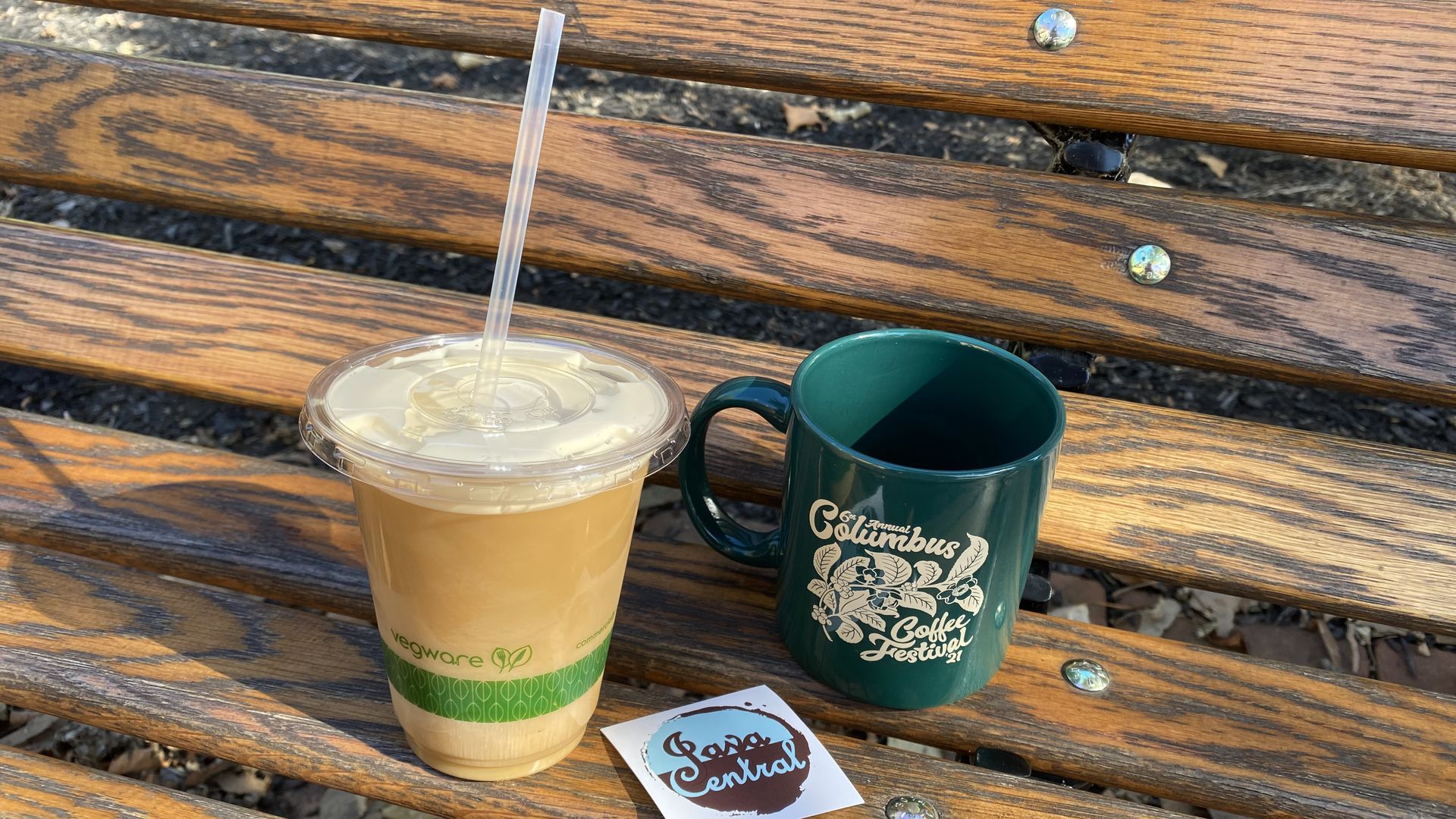Coffee cups on a table from the Columbus Coffee Festival. 