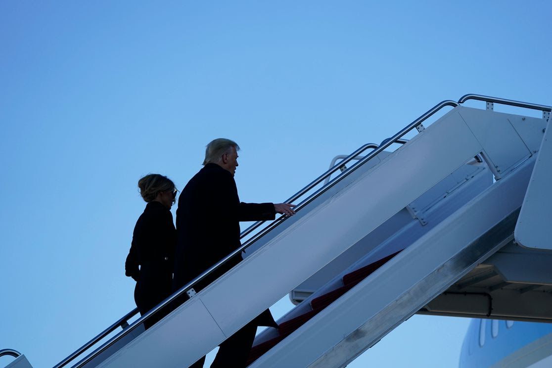 President Trump boards Air Force One for the last time as commander in chief. He and First Lady Melania Trump flew to Florida. Photo: Alex Edelman/AFP via Getty Images