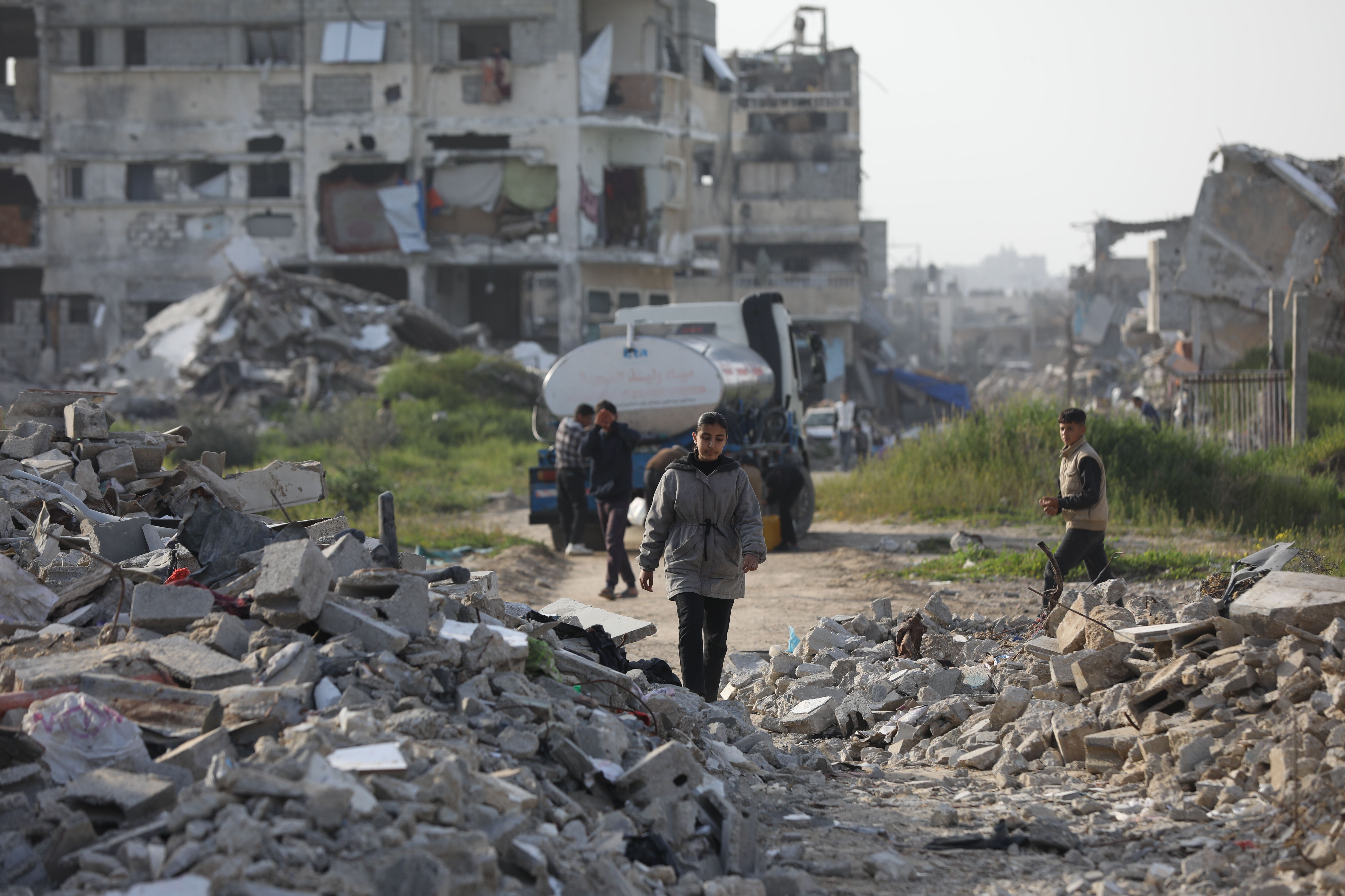 Palestinians try to continue their daily lives in rubble of buildings or their makeshift tents on the fifth day of Ramadan at the Bureij Refugee Camp in Gaza City, Gaza on March 05, 2025. With the end of the first phase of the ceasefire and prisoner and hostage swap deal in Gaza, Palestinians are co
