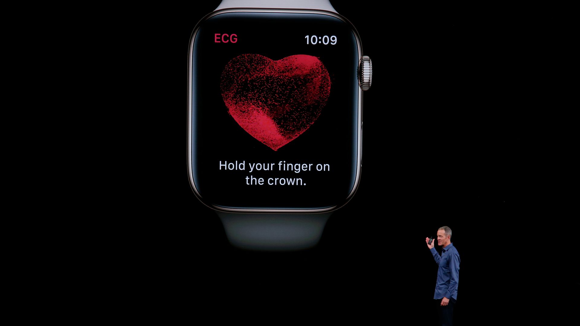 An Apple executive presents the EKG reader on the new Apple Watch