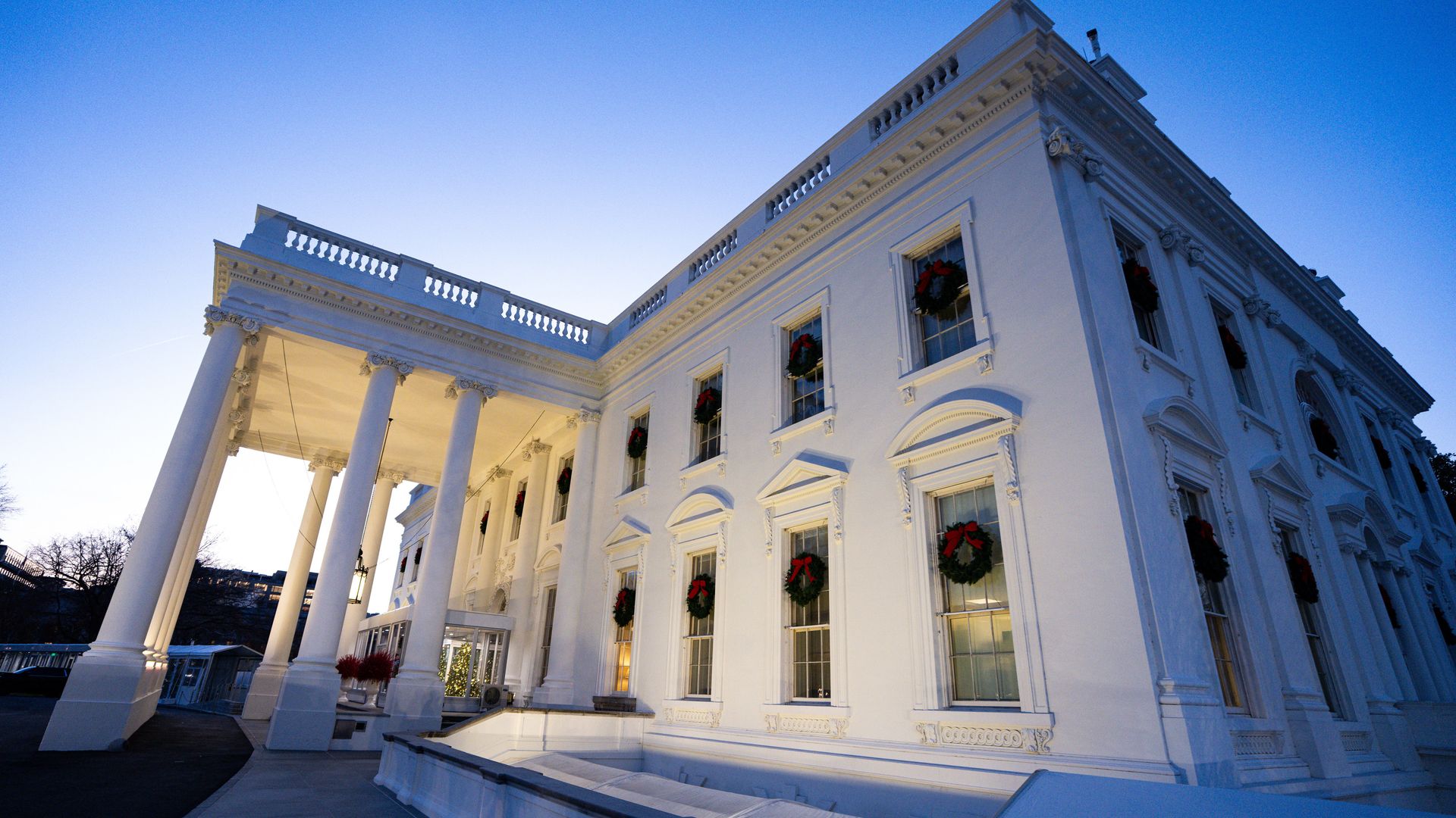 The north portico of the White House seen in the evening.