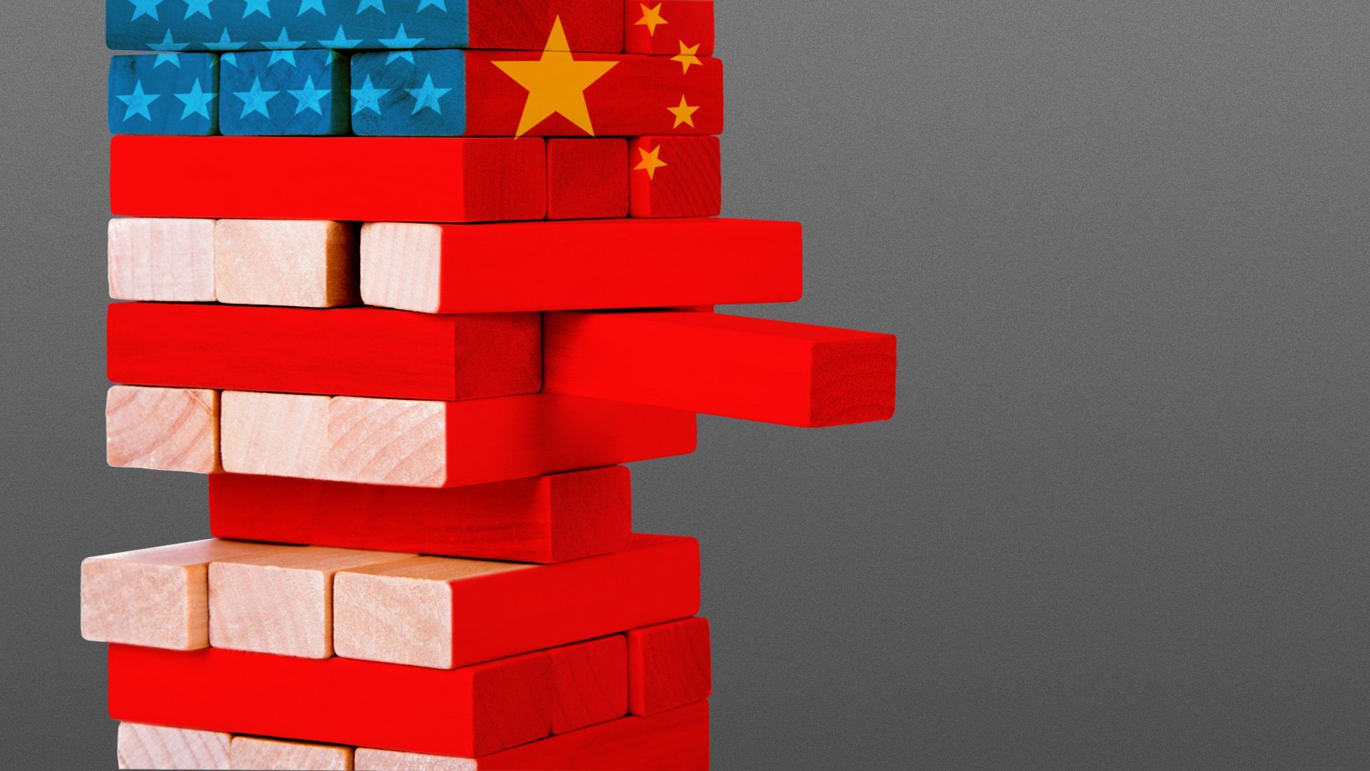 Illustration of a pile of jenga blocks with the colors and stars of the U.S. and Chinese flags