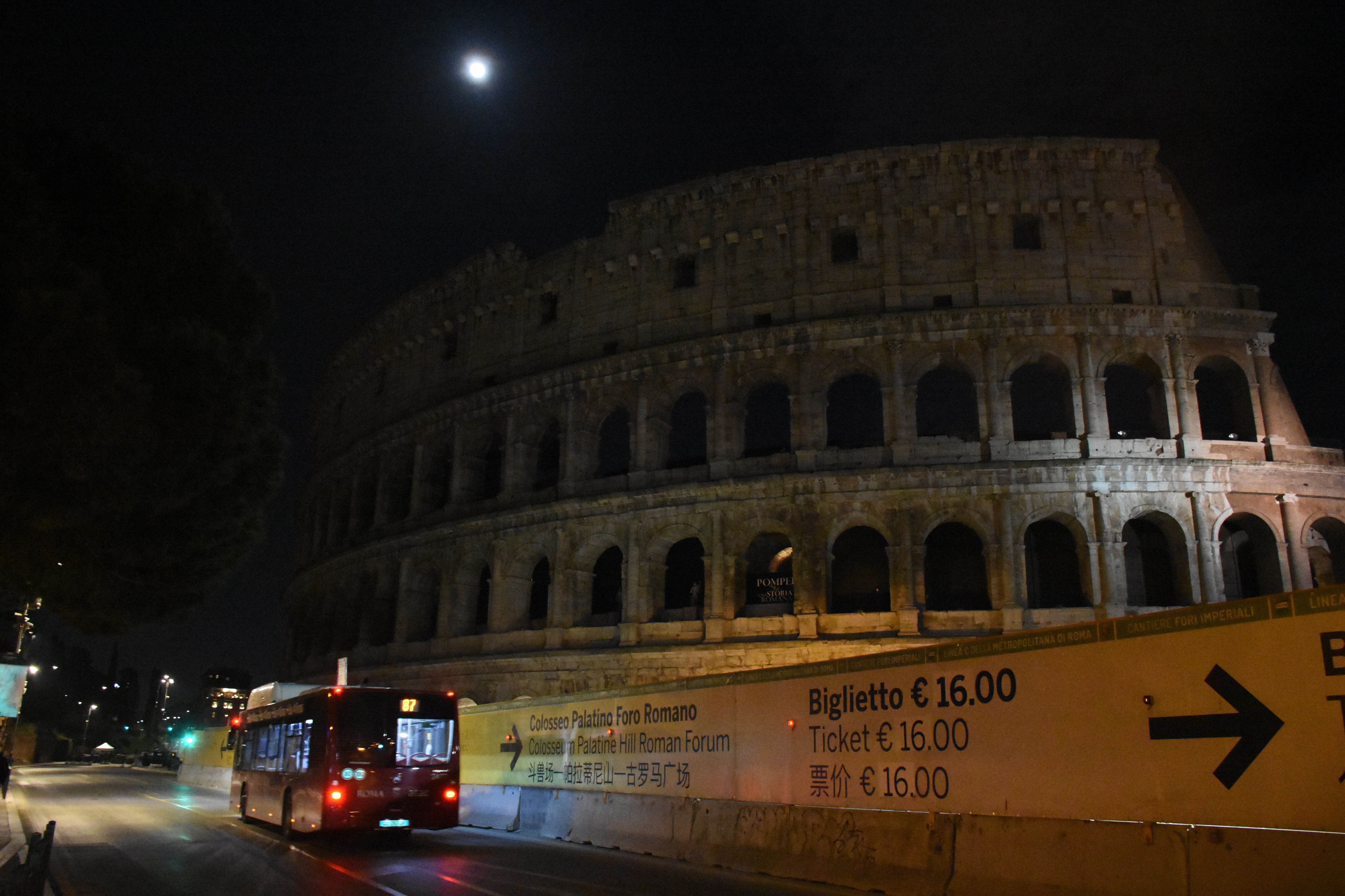 A view of the Colosseum in Rome, Italy, with the lights off. 