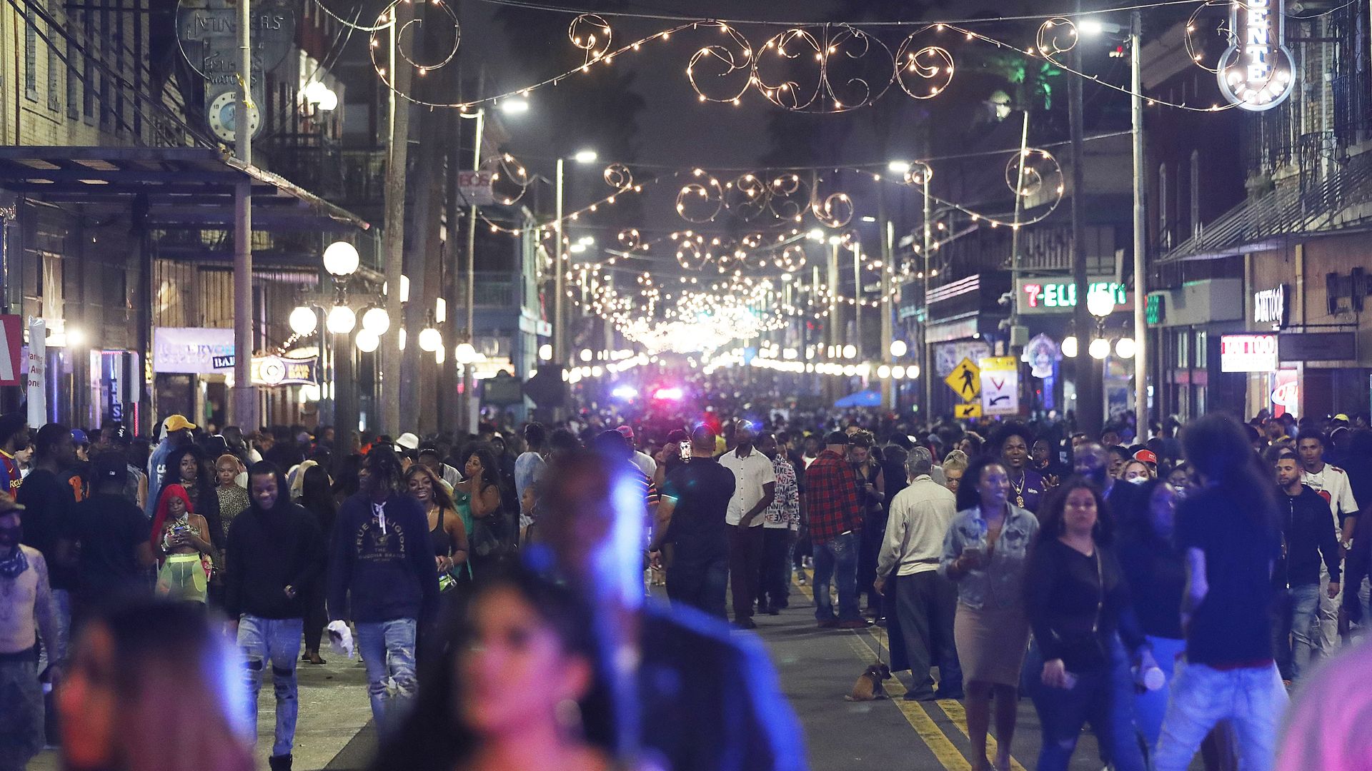 Ybor City street scene, crowded with people