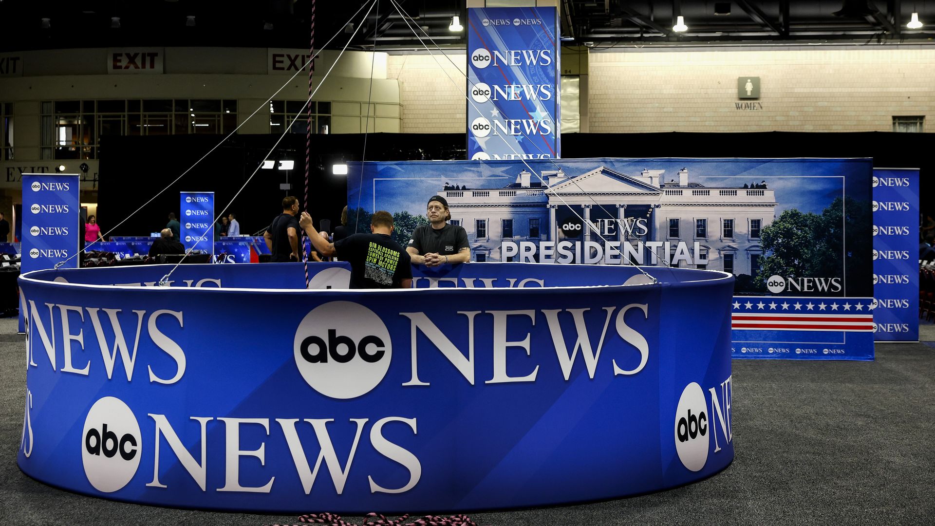 Final preparations are made in the spin room prior to the ABC News Presidential Debate with signs reading ABC News 