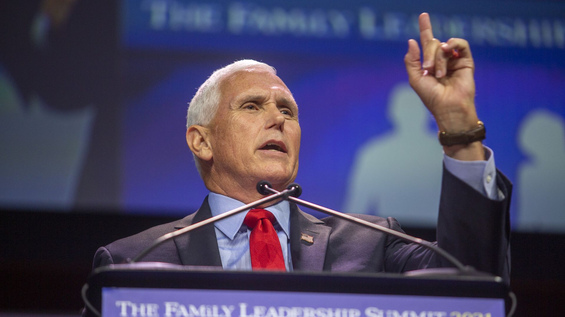Former Vice President Mike Pence is seen speaking at a political rally.