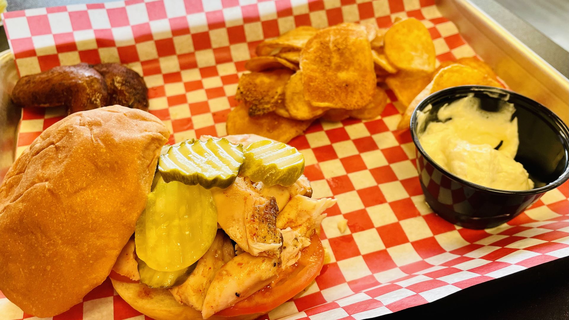 A photo of a sandwich from King Smoke Texas BBQ