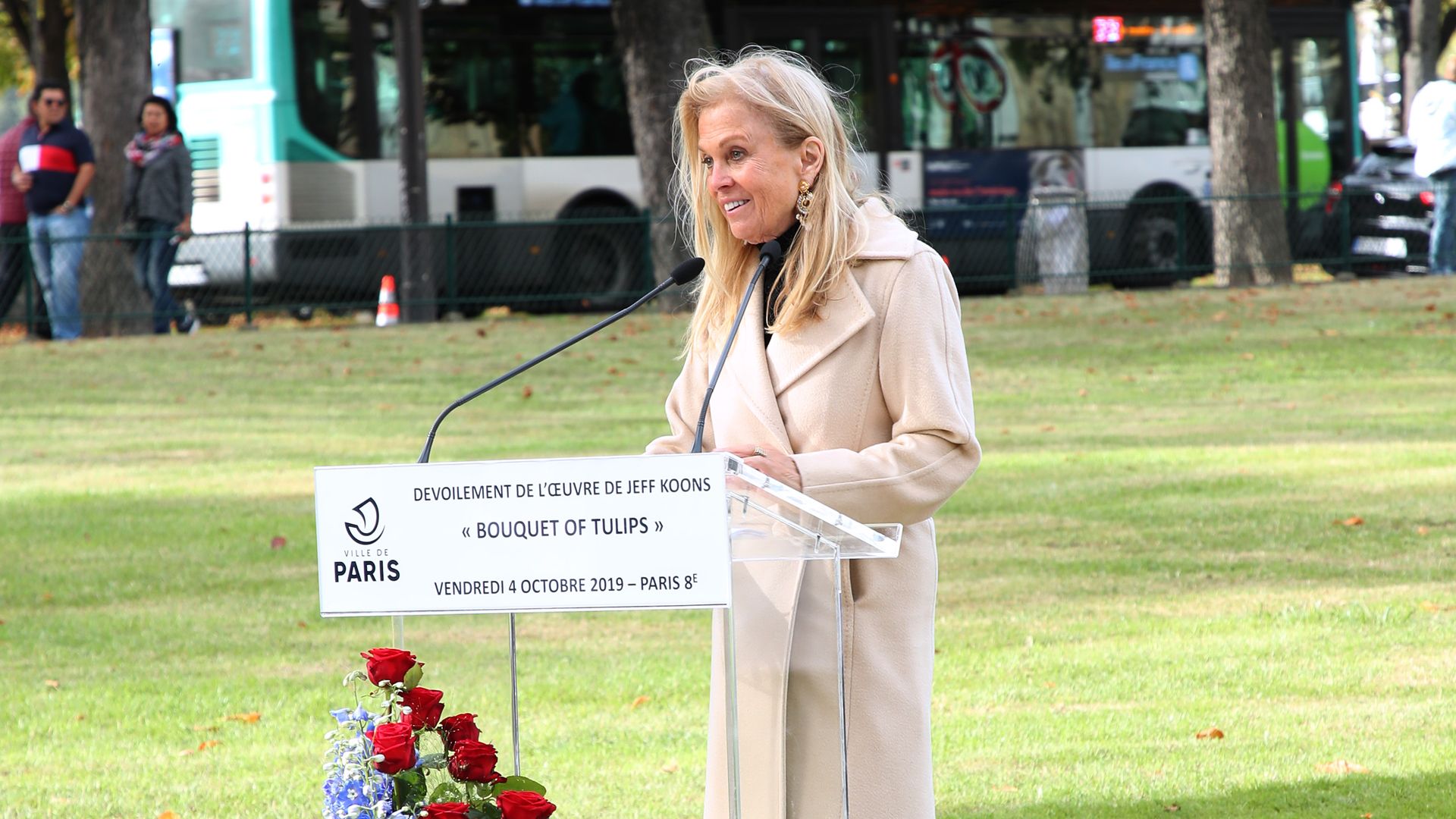 Jane D. Hartley makes a speech during the Jeff Koons' Artwork "Tulips Bouquet"
