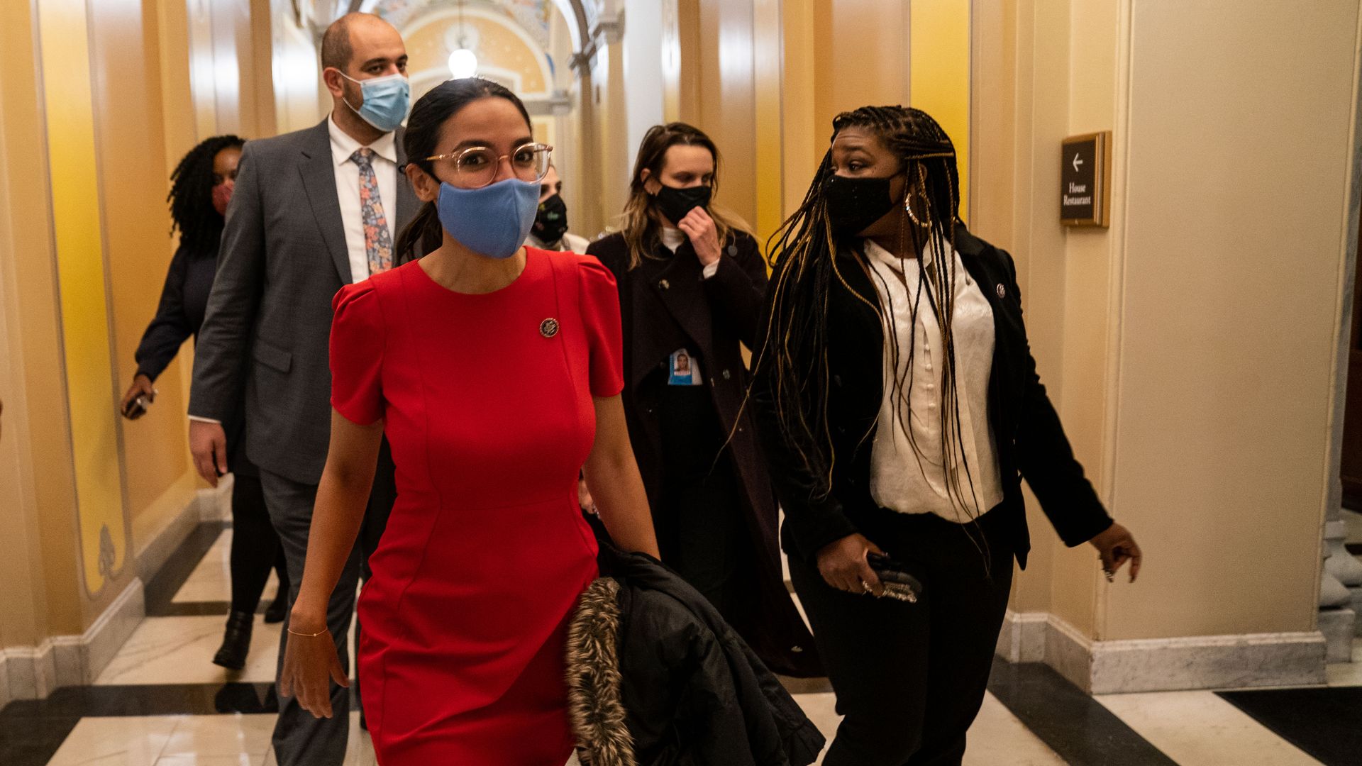 Reps. Alexandria Ocasio-Cortez and Cori Bush are seen walking through the U.S. Capitol last month.
