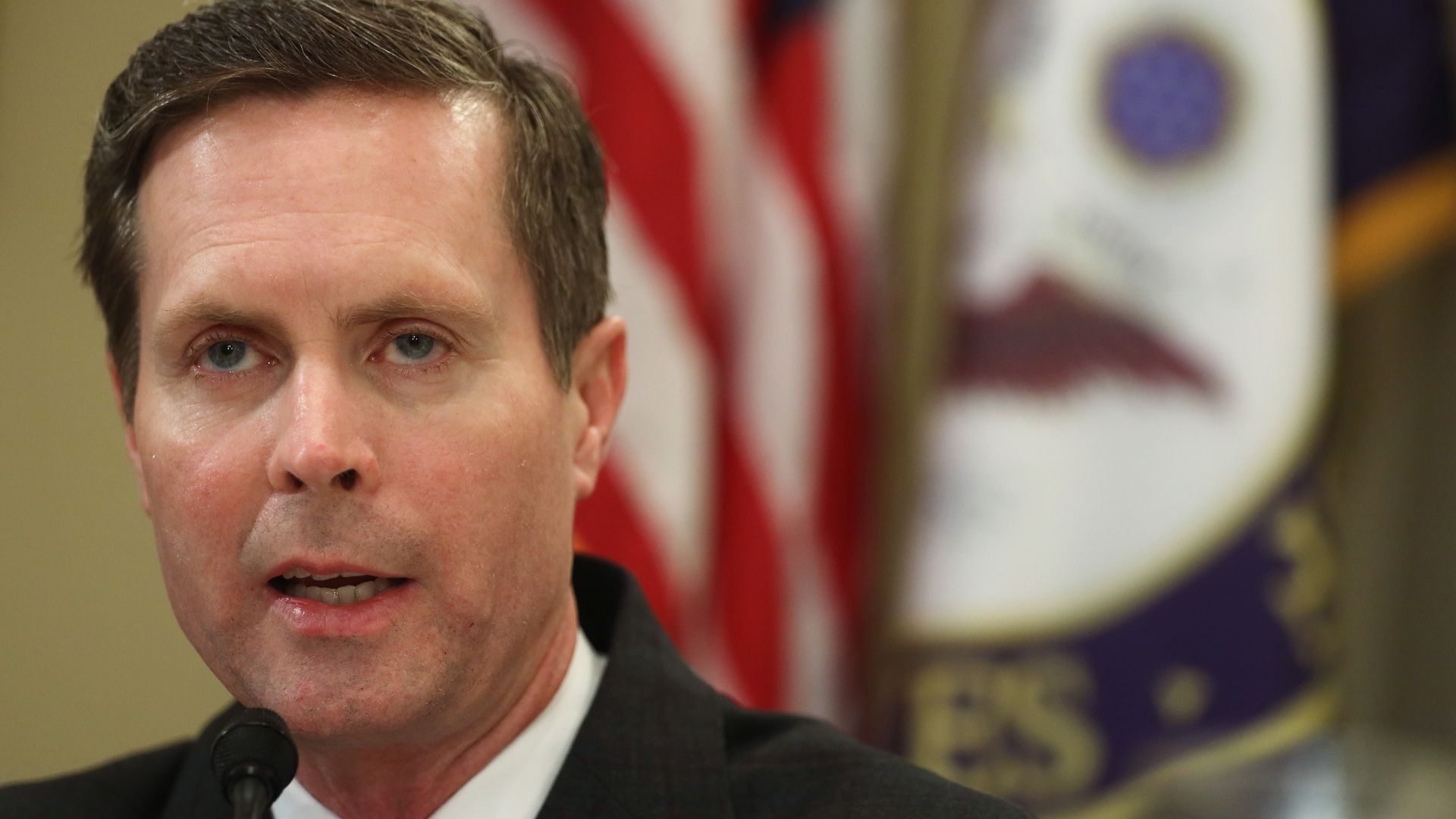 Rep. Rodney Davis speaking into a microphone