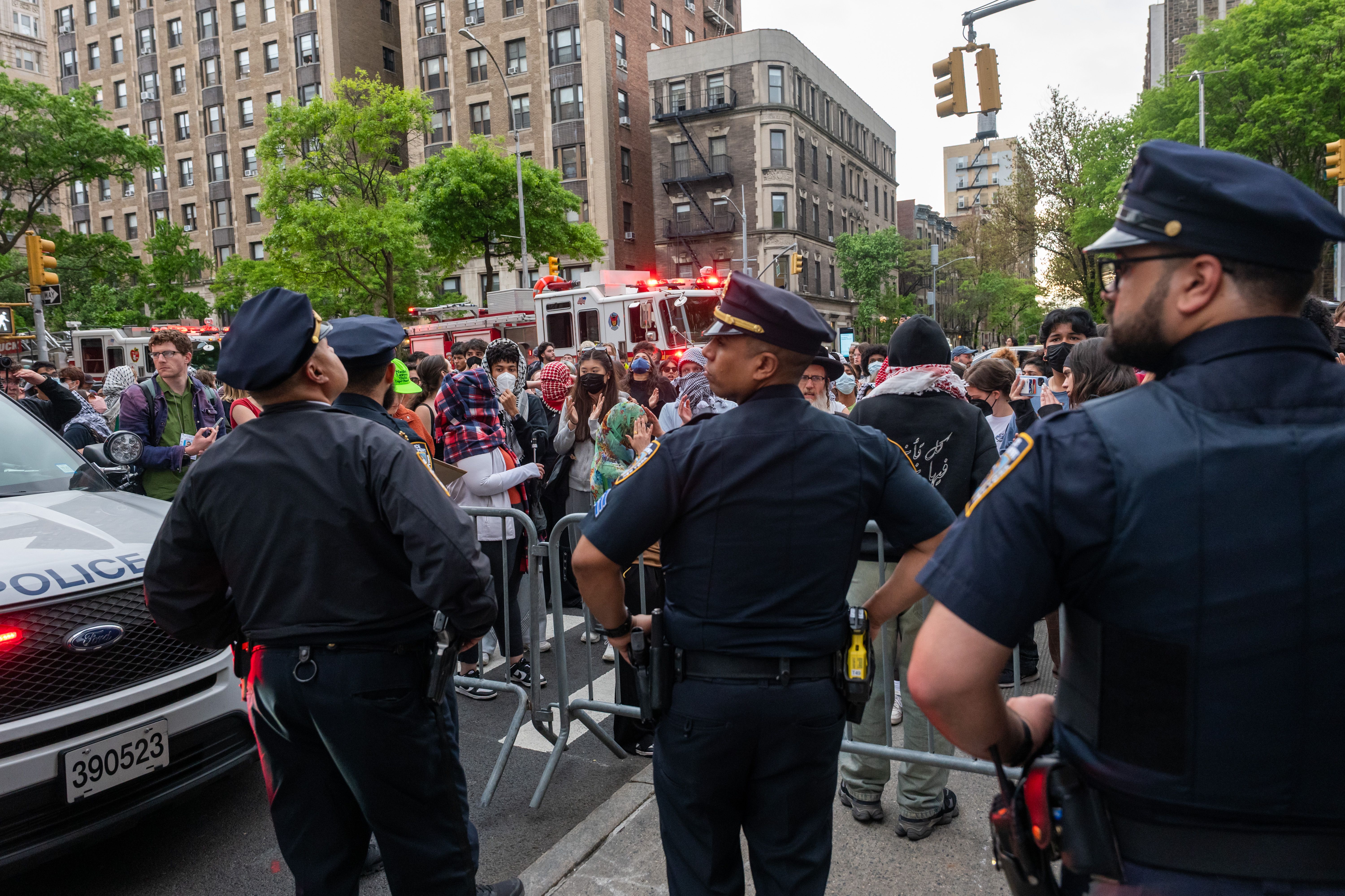 NEW YORK, NEW YORK - MAY 07: NYPD officer looks on as protesters gather outside of Columbia University's Butler Library after pro-Palestinian protesters occupied the space on May 07, 2025 in New York City. Crowds of protesters grew as a standoff with security and a group calling themselves "Columbia