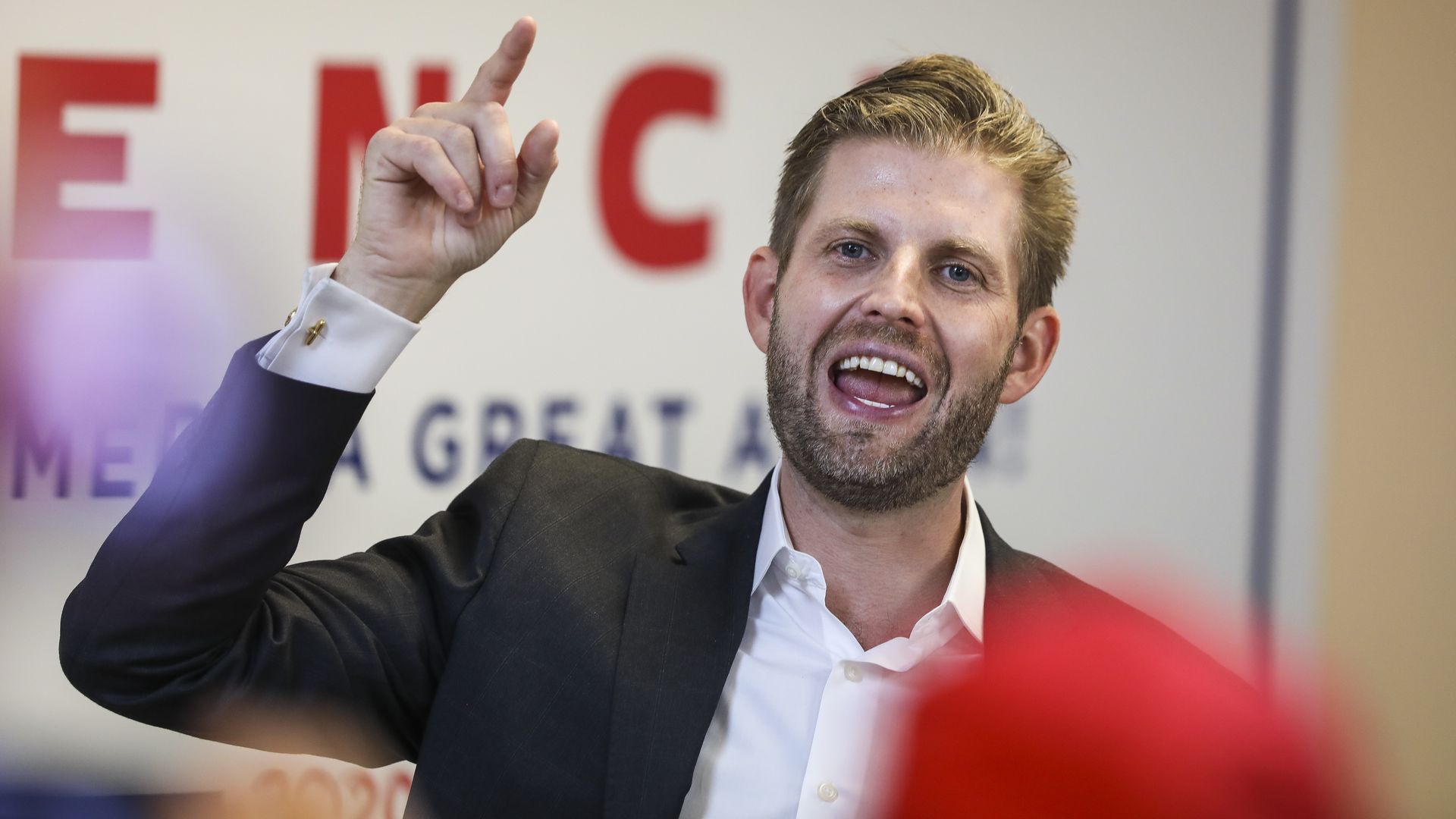 Eric Trump while speaking and gesturing 