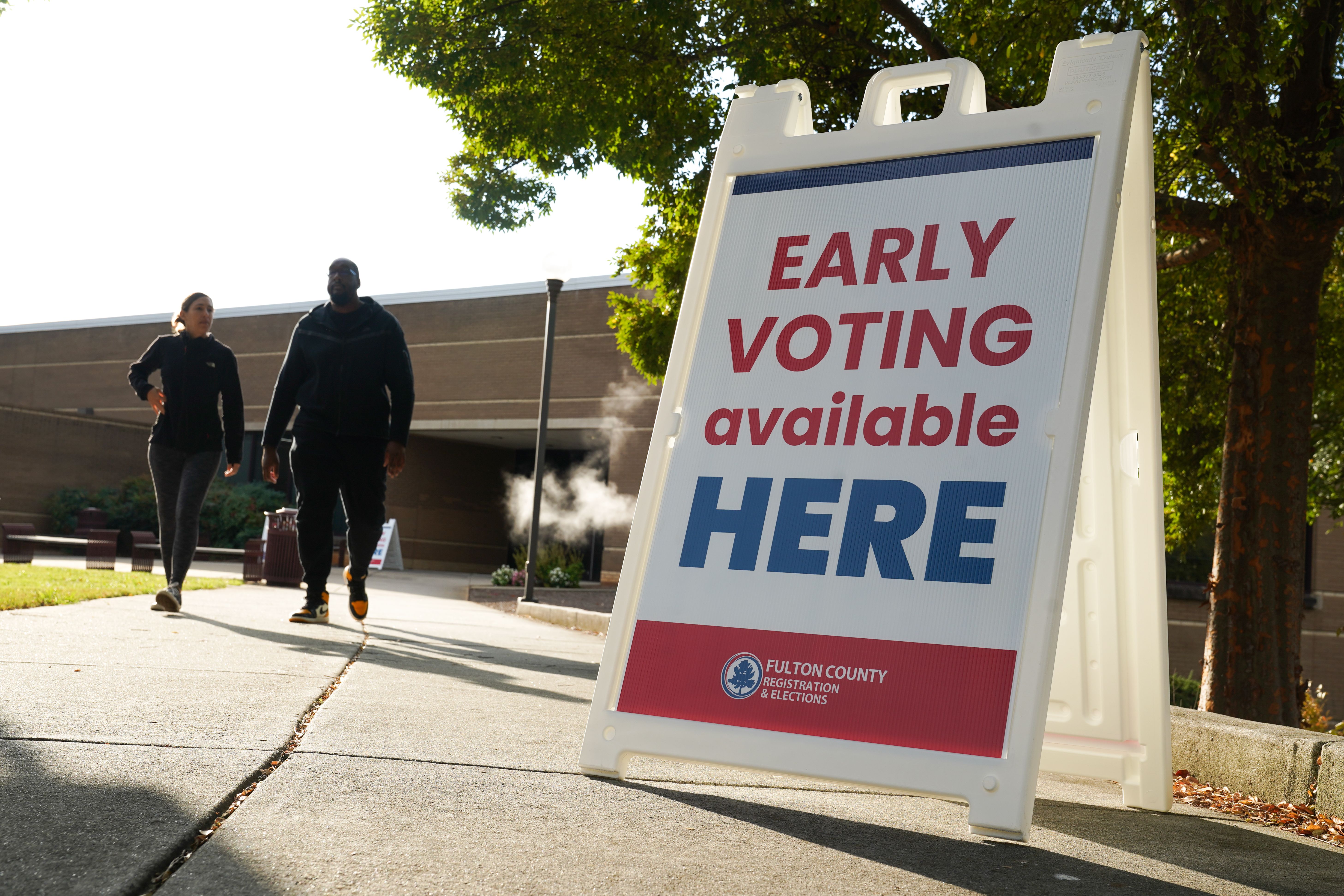 A voting sign directs people where to vote at a building in Atlanta, Georgia.