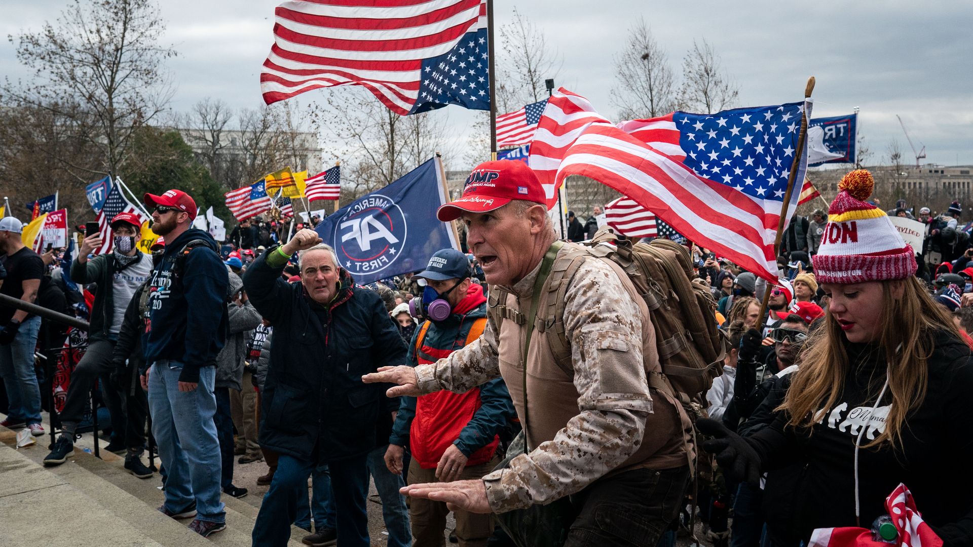 Ray Epps, in the red Trump hat, in front of the U.S. Capitol in D.C. on Jan. 6, 2021.