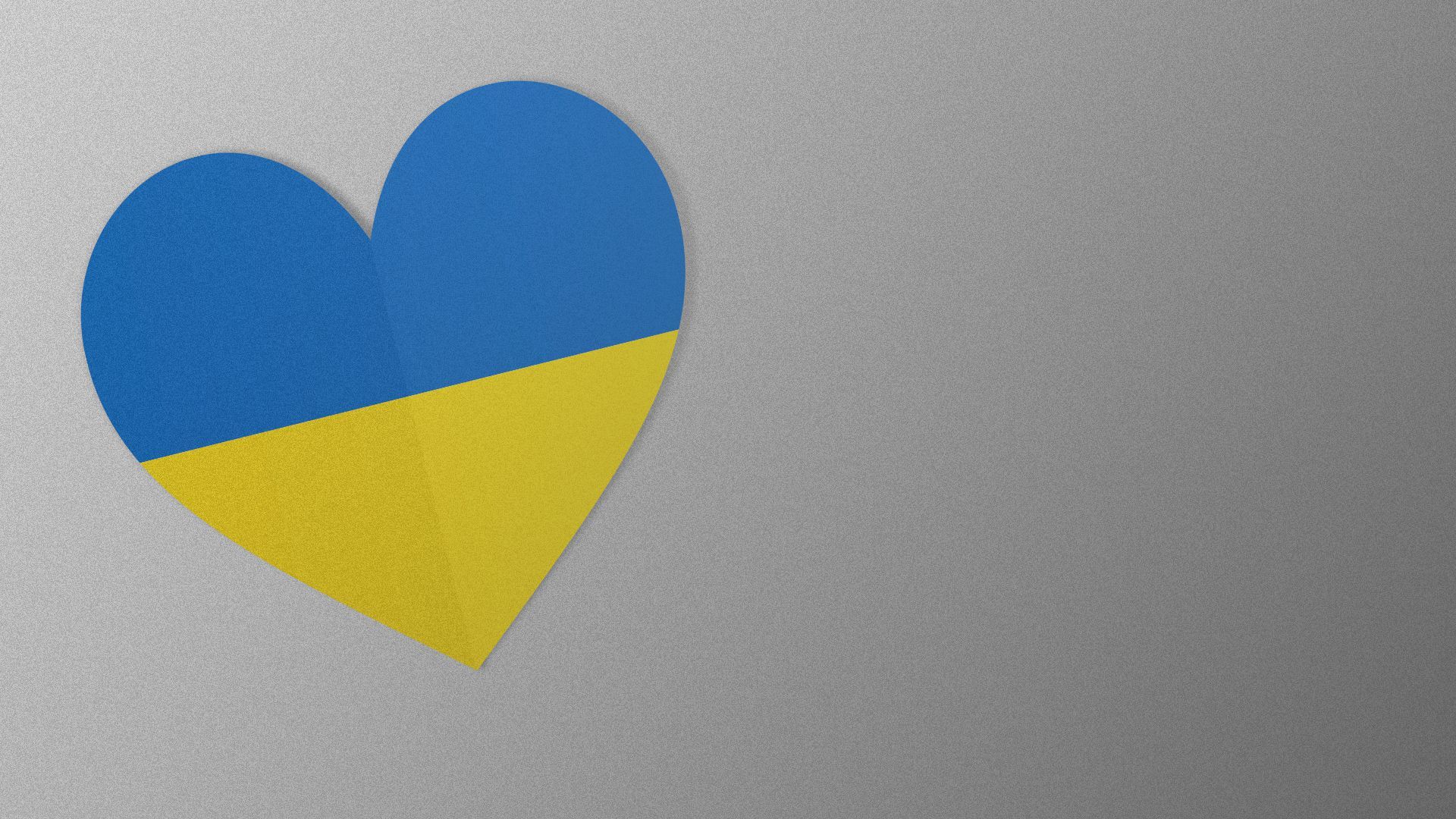Illustration of a paper heart overlaid with the Ukrainian flag.