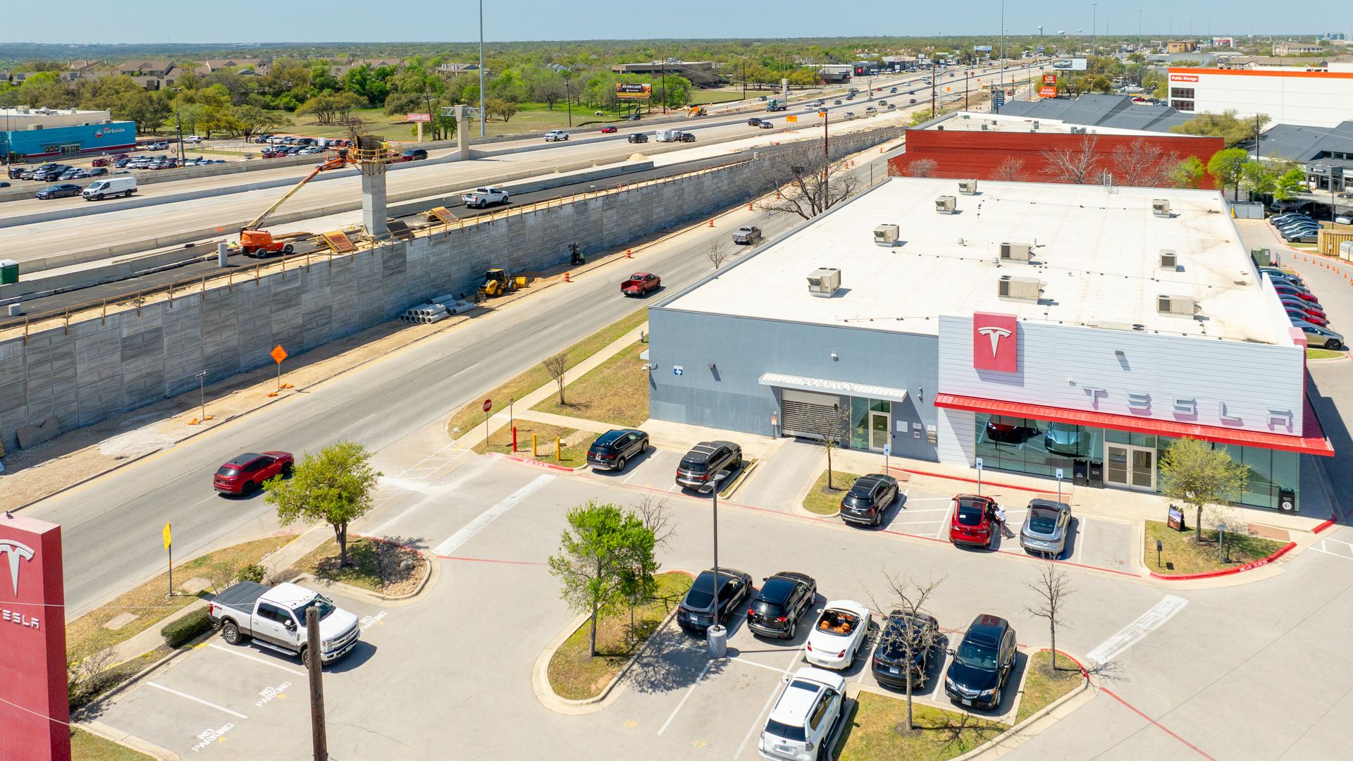 An Aerial view of a Tesla dealership