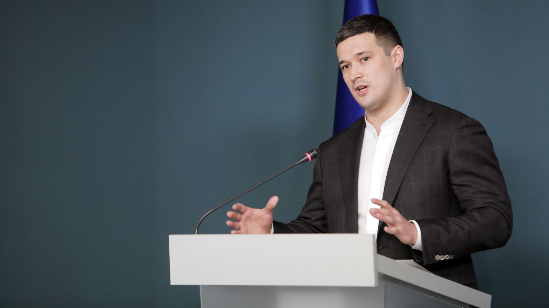 Photo of a man at a podium