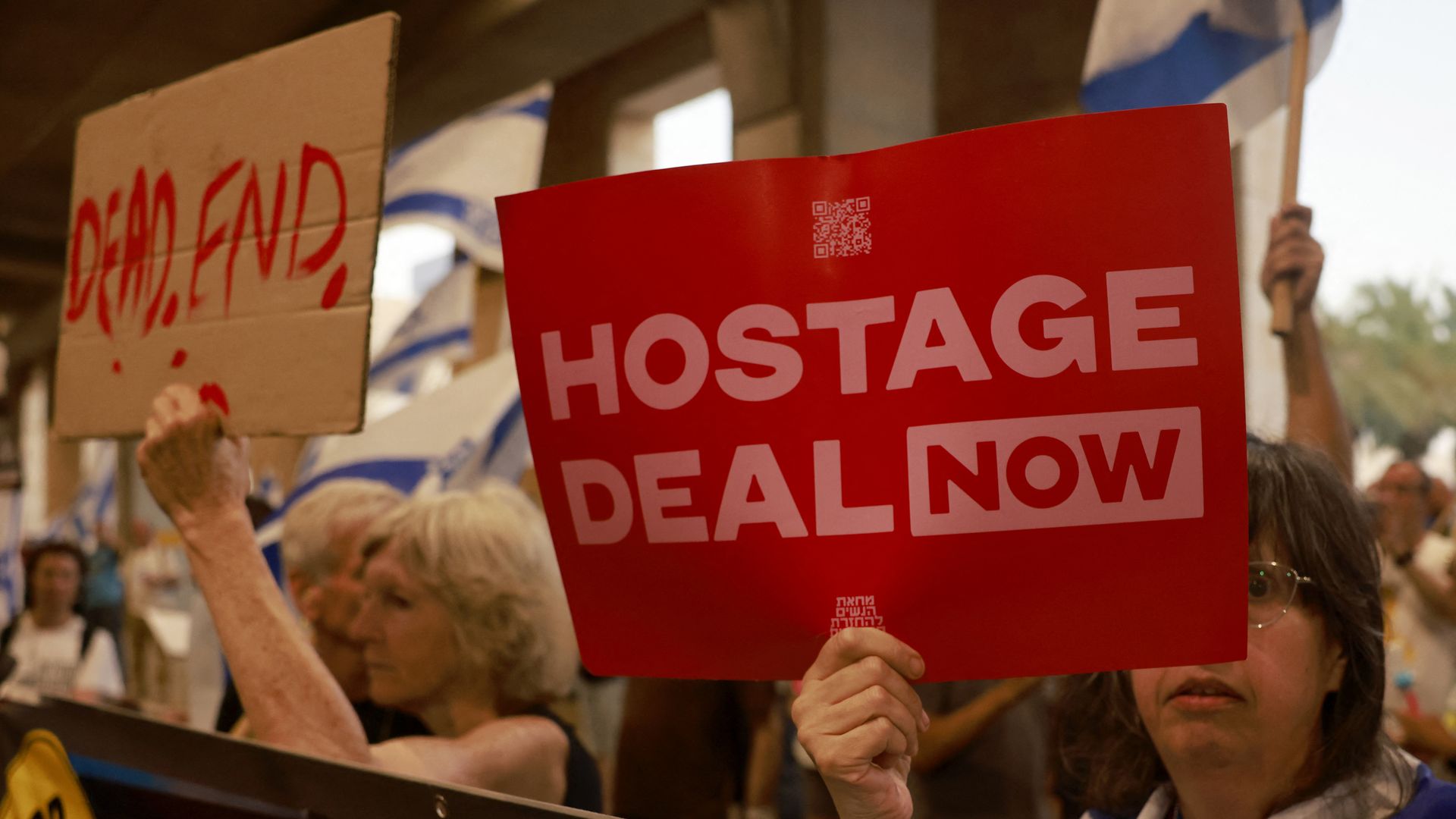 Families and supporters of Israeli hostages held by the Palestinian militant group Hamas in the Gaza Strip since October 7, protest at Ben Gurion International Airport, near Tel Aviv on July 21, 2024,