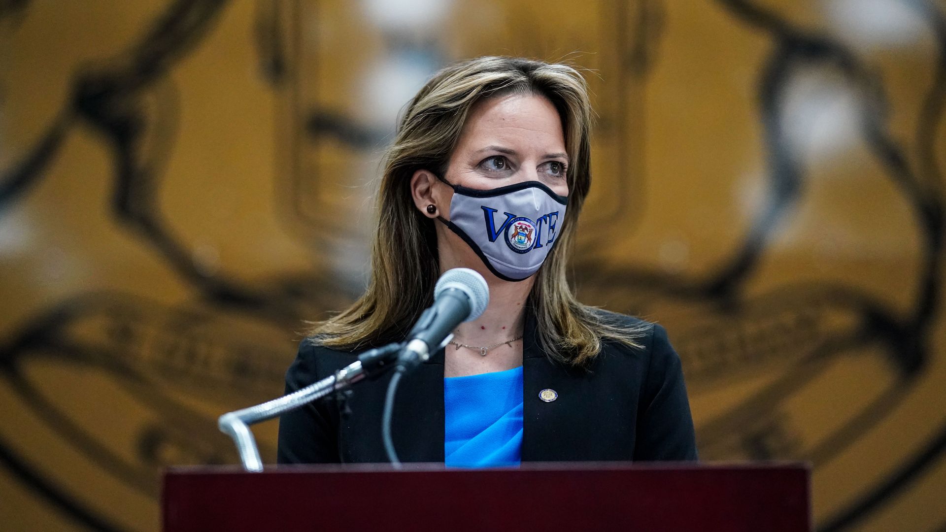 Secretary of State Jocelyn Benson speaks during a press conference.