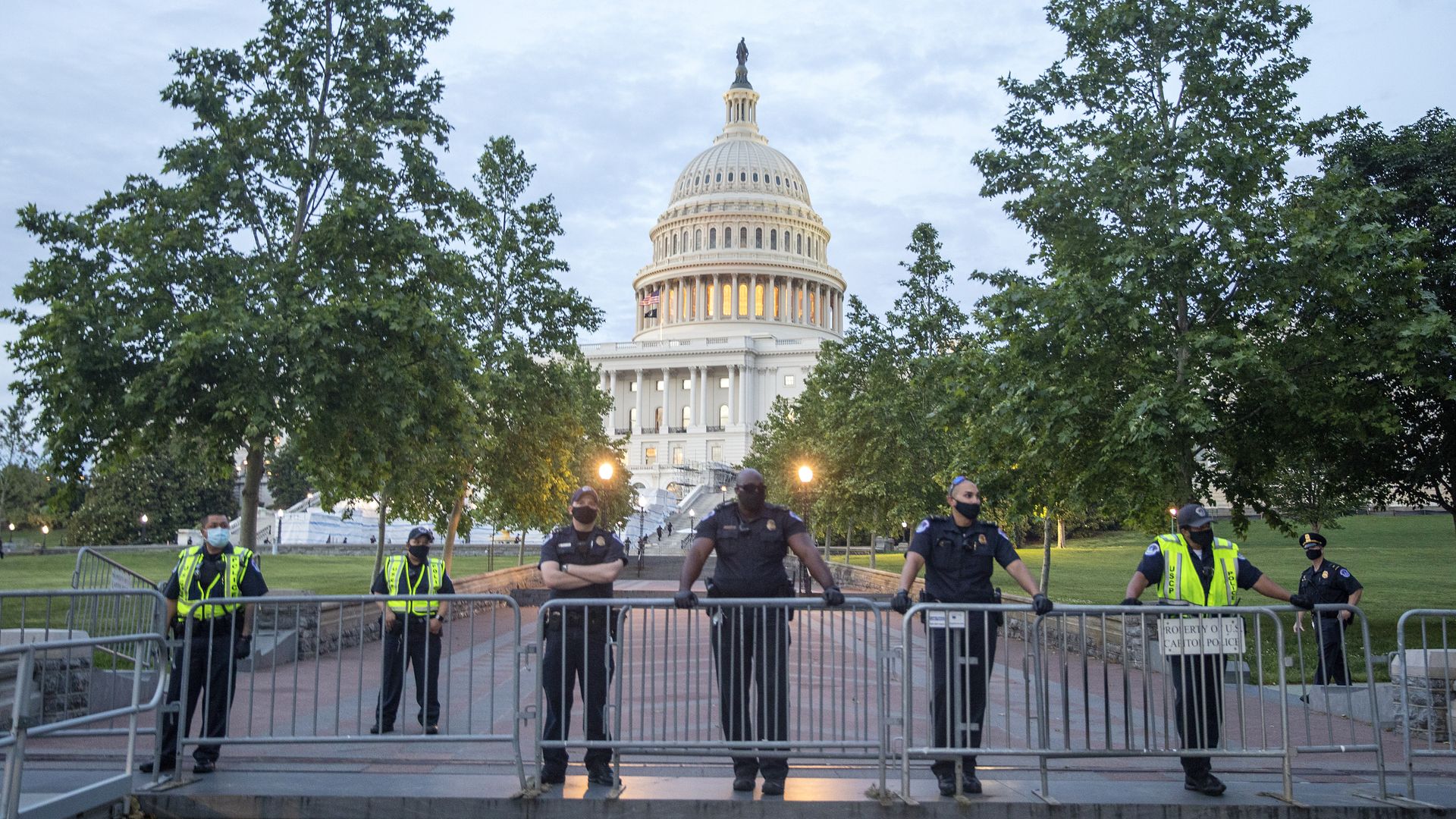 Capitol Police look on as demonstrators protest the killing of George Floyd near the US Capitol