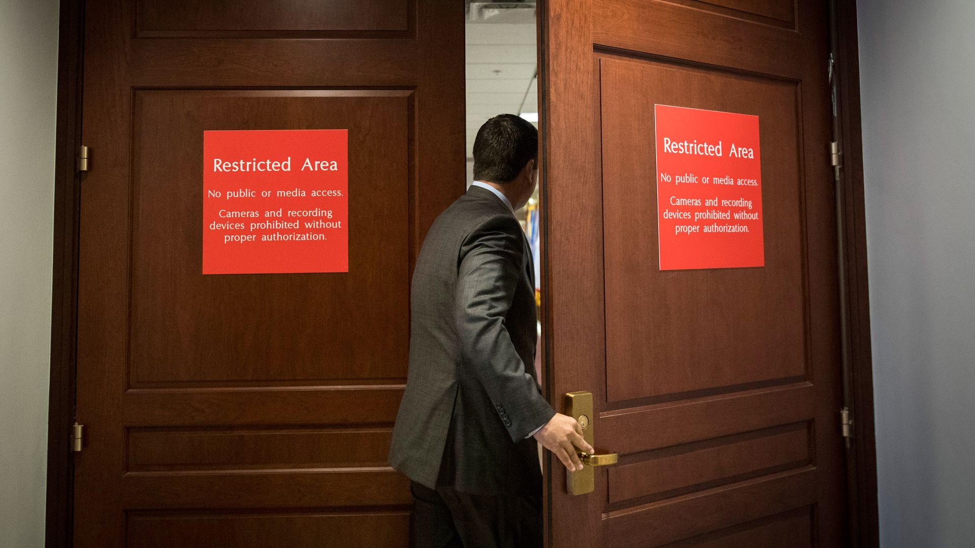 Devin Nunes entering a room
