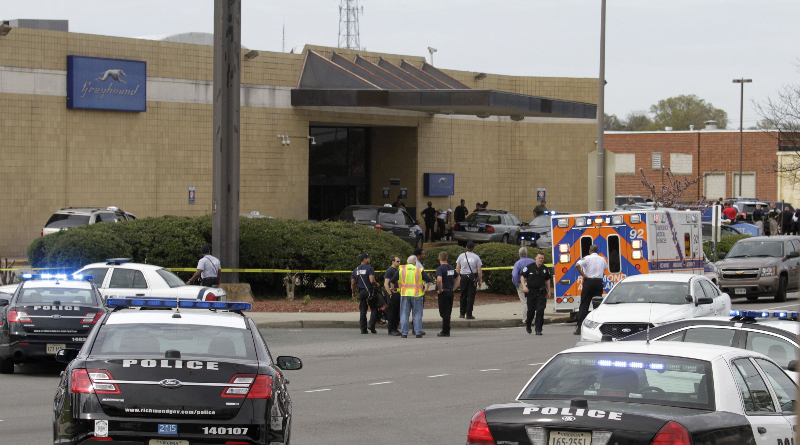 RICHMOND, VA - MARCH 31: Police secure the scene of a shooting at a Greyhound bus station March 31, 2016 in Richmond, Virginia. A gunman was killed and a Virginia state trooper later died at an area hospital from injuries sustained in the shootout, according to published reports. Two civilians were 
