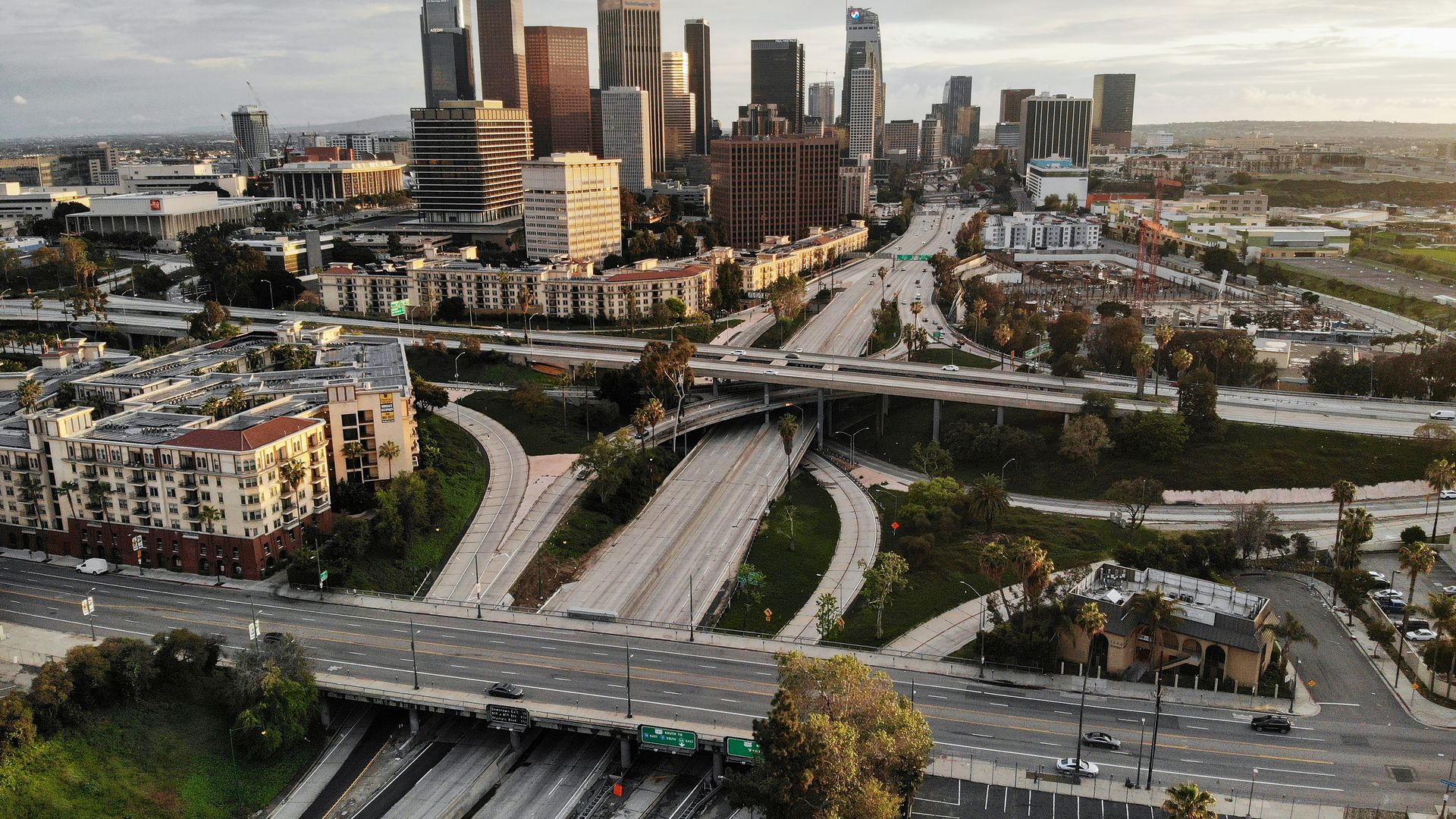 An aerial view of light traffic before sunset on the I-110 and SR-101 freeways and Sunset Boulevard amid the coronavirus pandemic on April 6, 2020 in Los Angeles