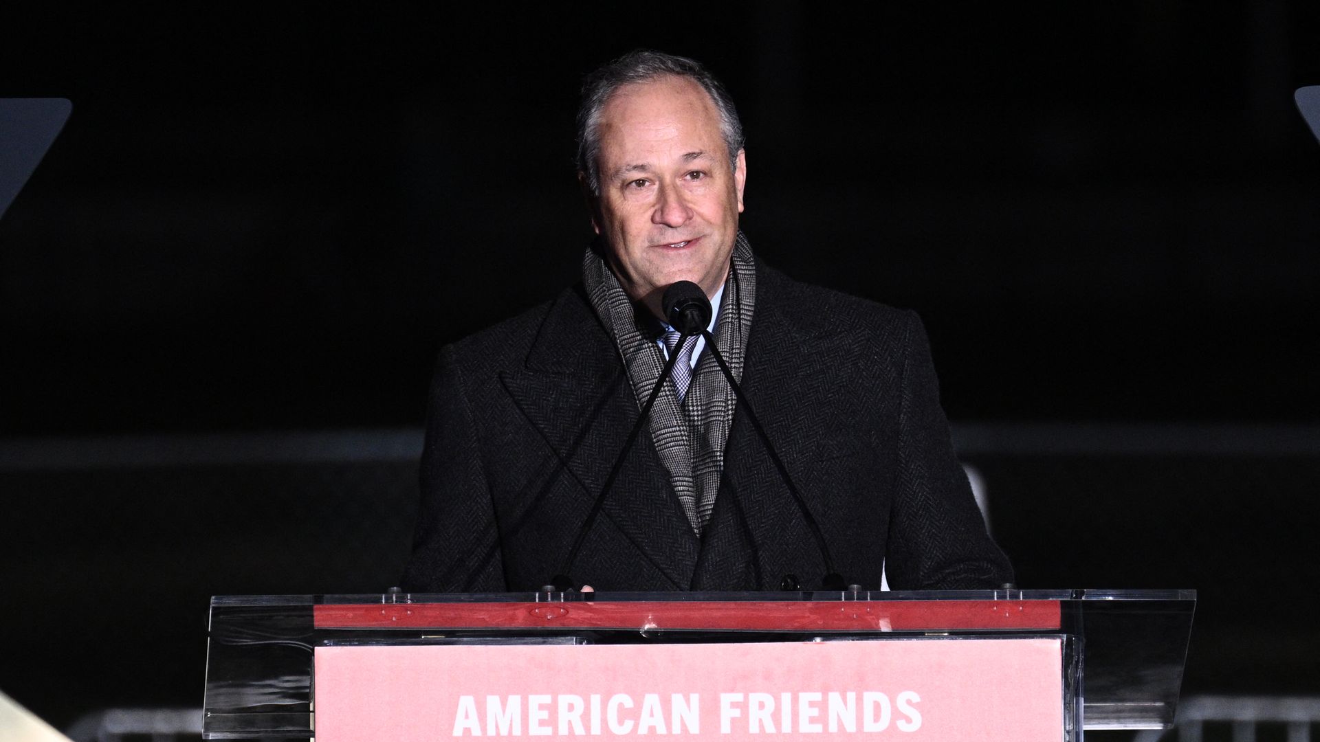 Doug Emhoff speaks at podium