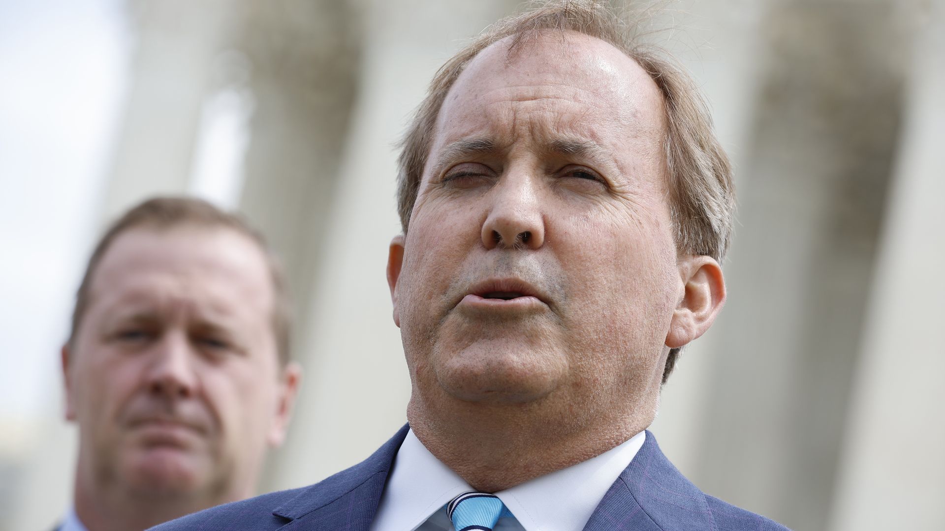 Texas Attorney General Ken Paxton outside of the Supreme Court in April 2022.
