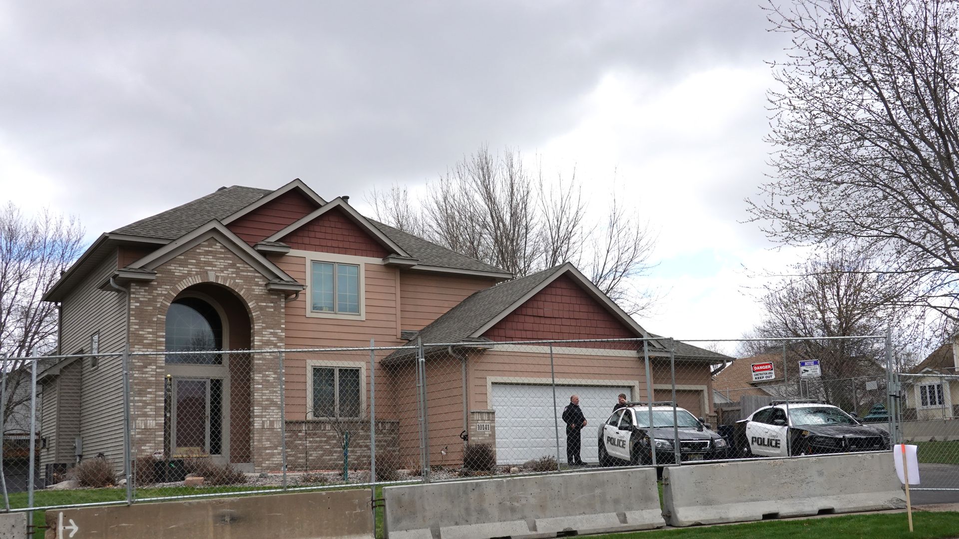 house of former officer kim potter with barricades and fencing
