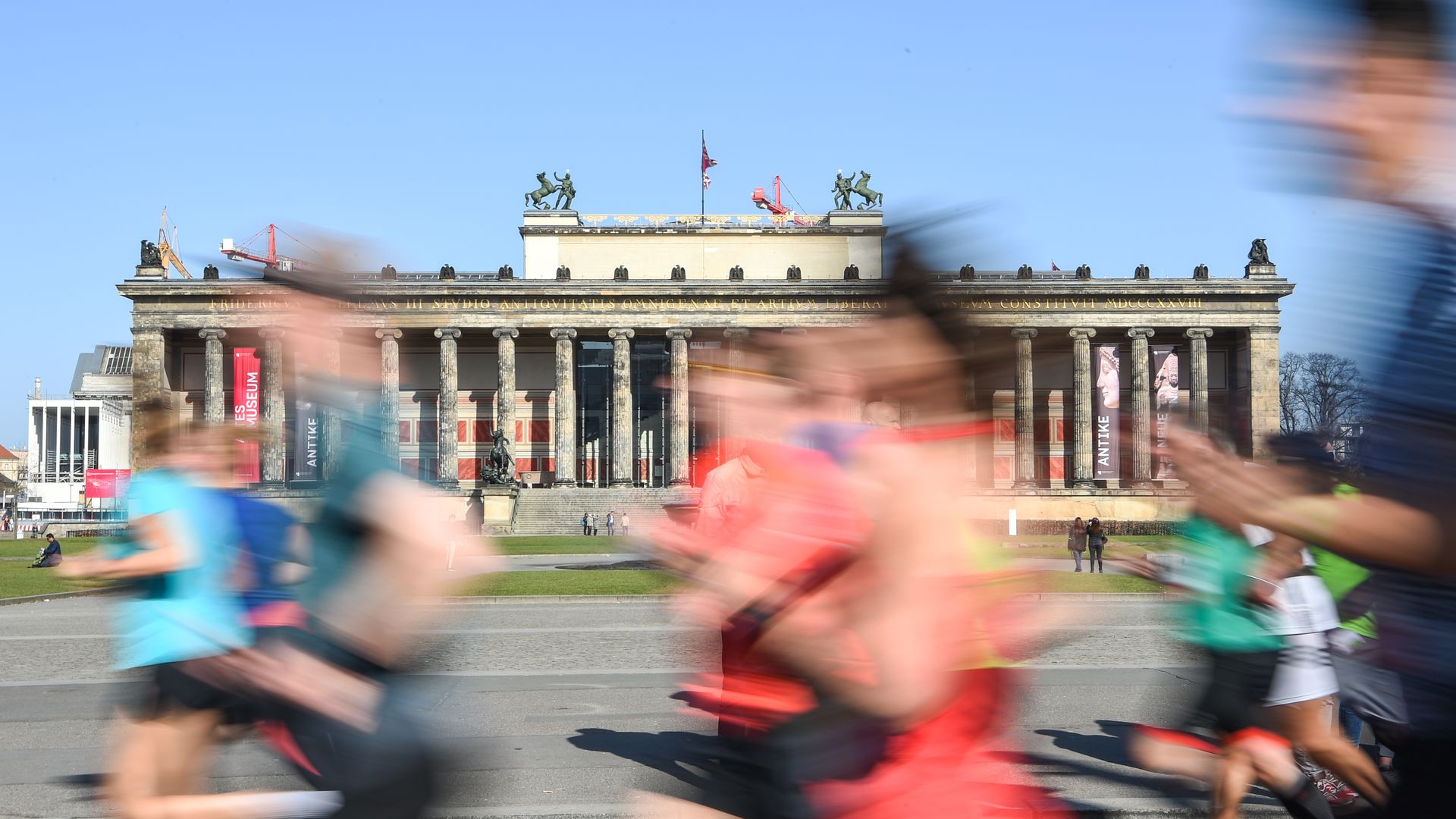 People run past the camera