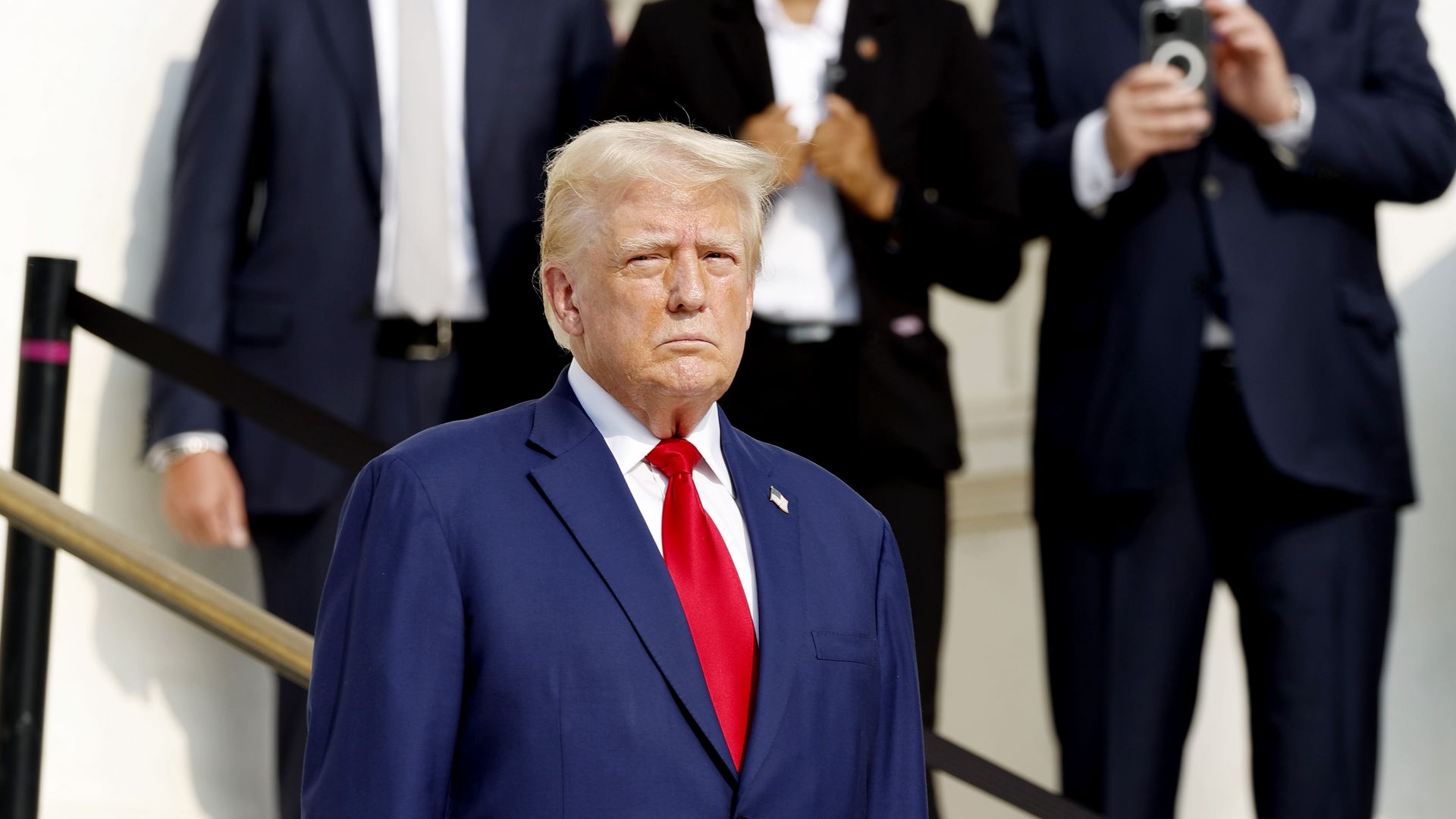 Republican presidential nominee, former U.S. President Donald Trump looks on during a wreath laying ceremony at the Tomb of the Unknown Soldier at Arlington National Cemetery on August 26, 2024 in Arlington, Virginia. 